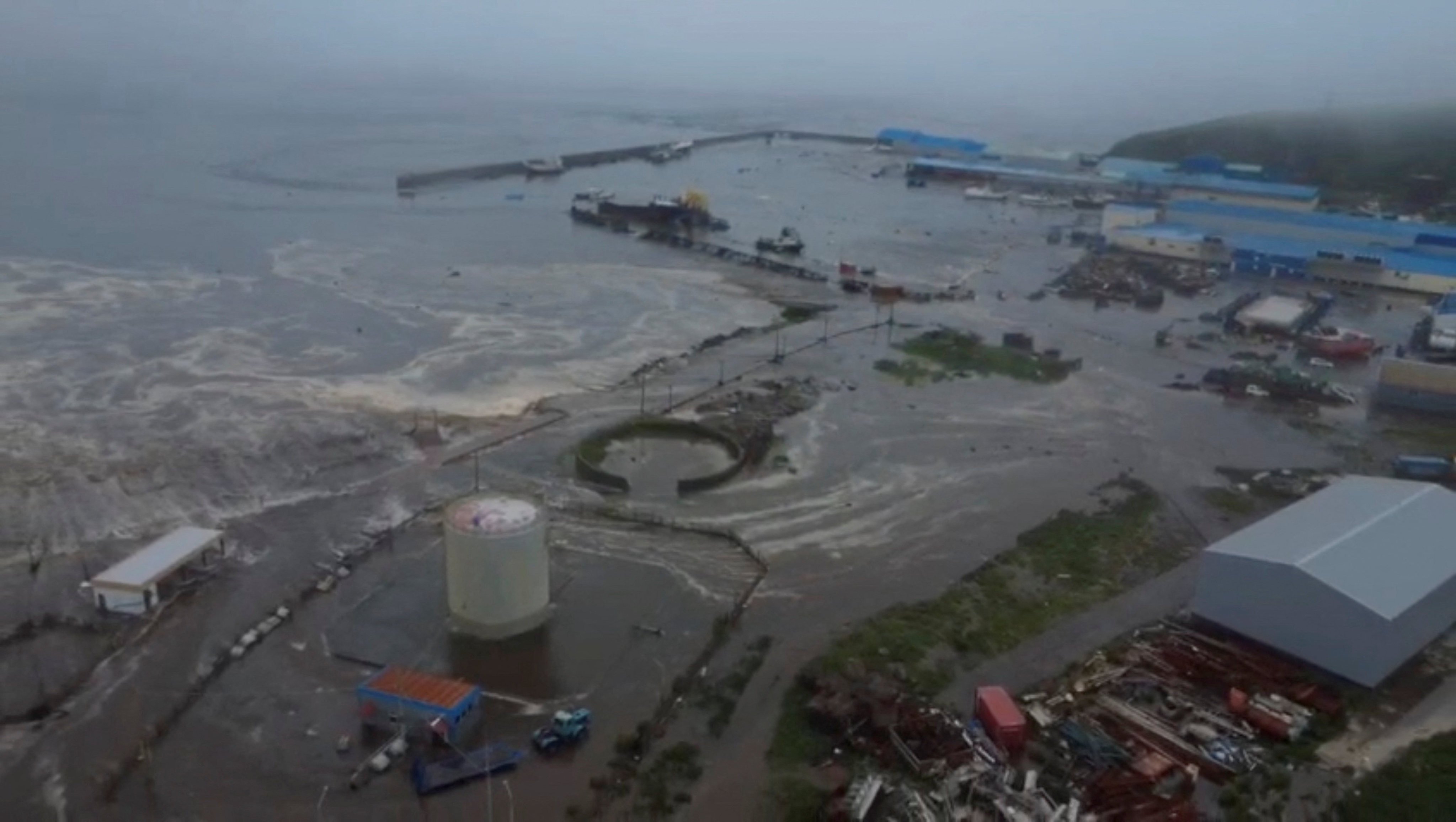Tsunami waves flood an area in the Sakhalin region of Russia on Wednesday after a magnitude 8.8 earthquake struck off the Kamchatka peninsula. Photo: Geophysical Survey of the Russian Academy of Sciences/Reuters