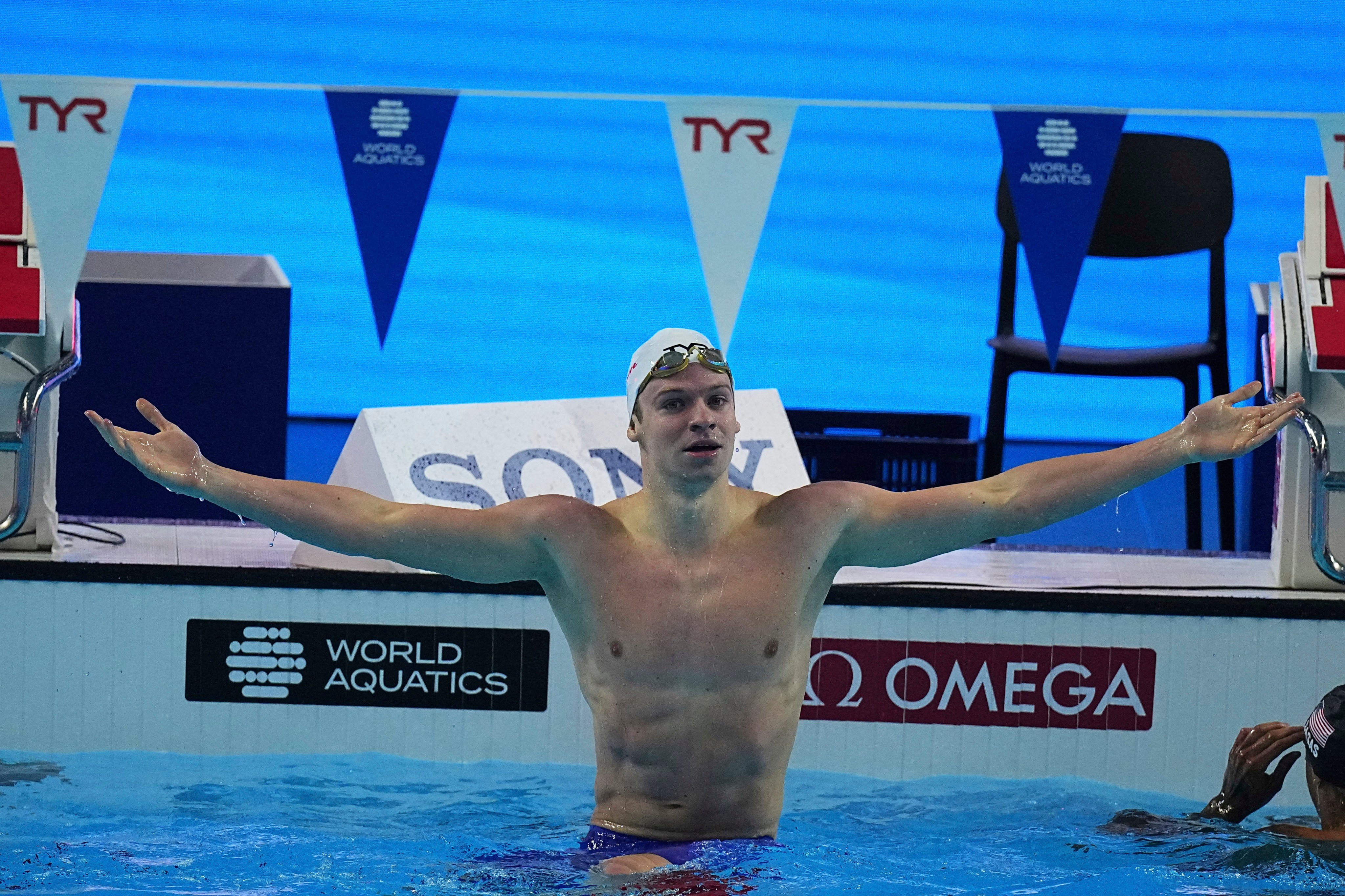 Leon Marchand celebrates his record at the World Aquatics Championships in Singapore on Wednesday. Photo: AP