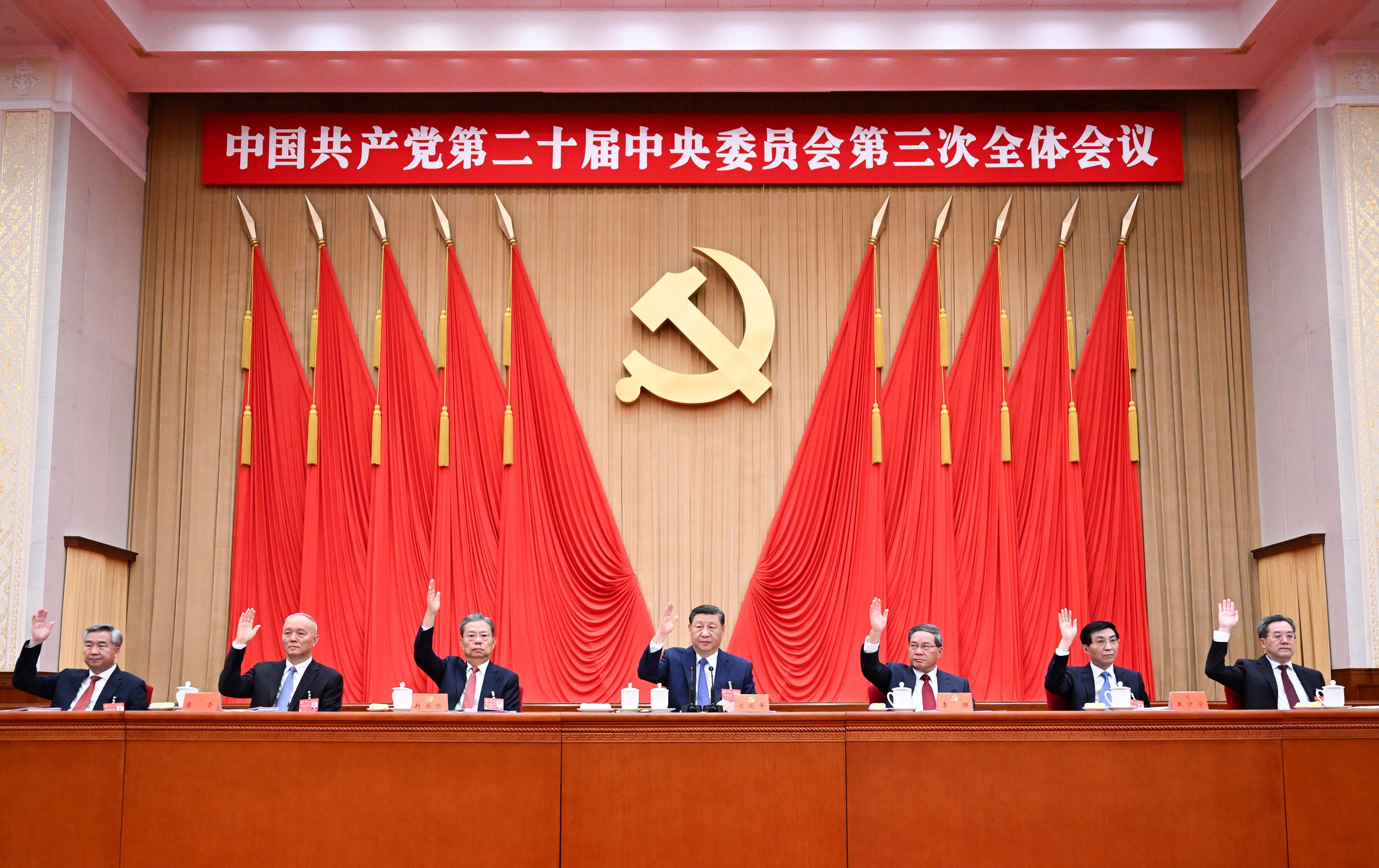 Politburo Standing Committee members (from left) Li Xi, Cai Qi, Zhao Leji, Xi Jinping, Li Qiang, Wang Huning and Ding Xuexiang attend the third plenary session of the 20th Communist Party Central Committee held in Beijing from July 15 to 18 of last year. Photo: Xinhua via AP