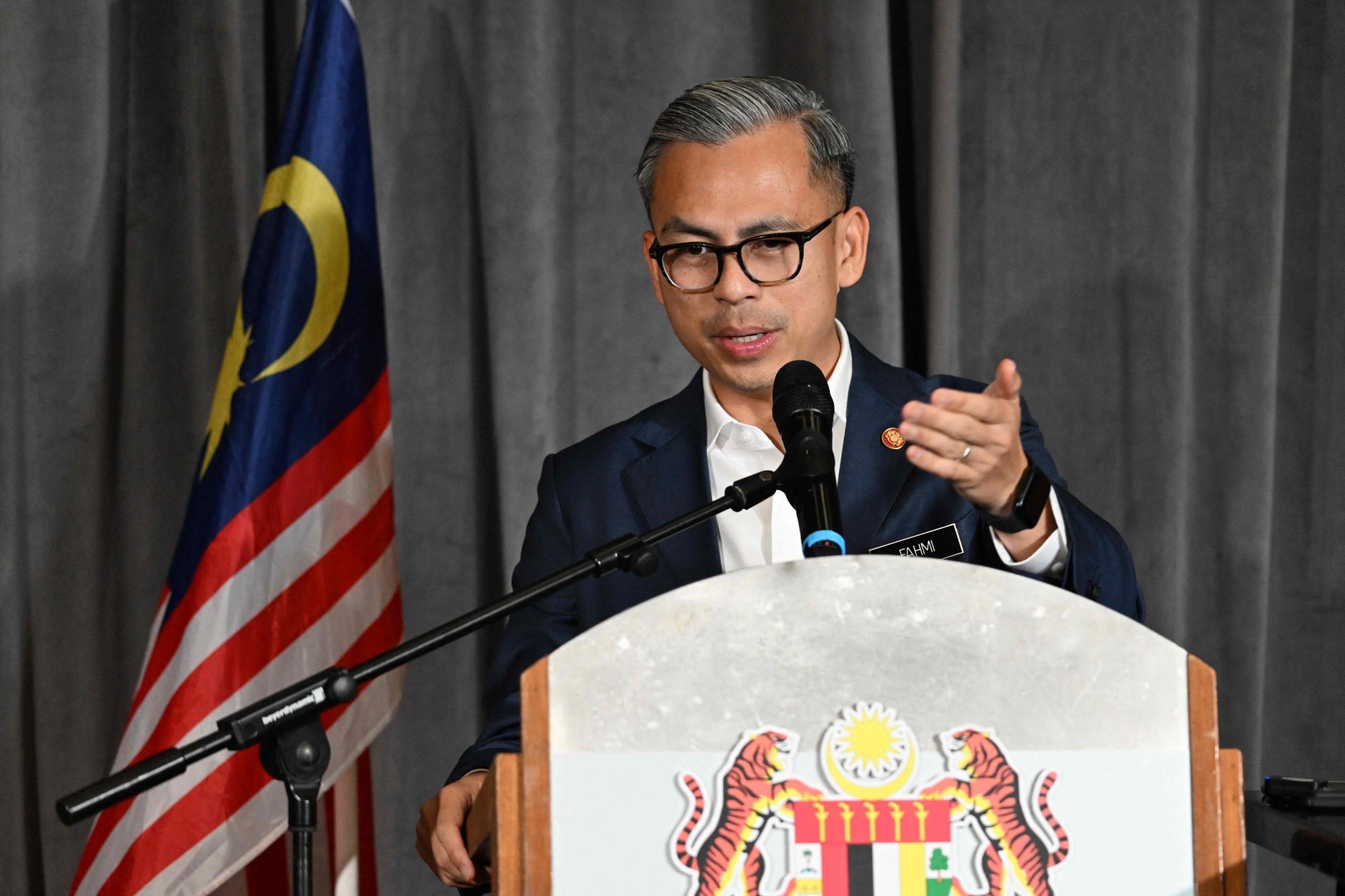 Malaysia’s Minister of Communications Fahmi Fadzil has warned parents against an overreliance on mobile devices to serve as “digital nannies” to keep their children occupied. Photo: AFP Malaysia’s Minister of Communications Fahmi Fadzil has warned parents against an overreliance on mobile devices to serve as “digital nannies” to keep their children occupied. Photo: AFP