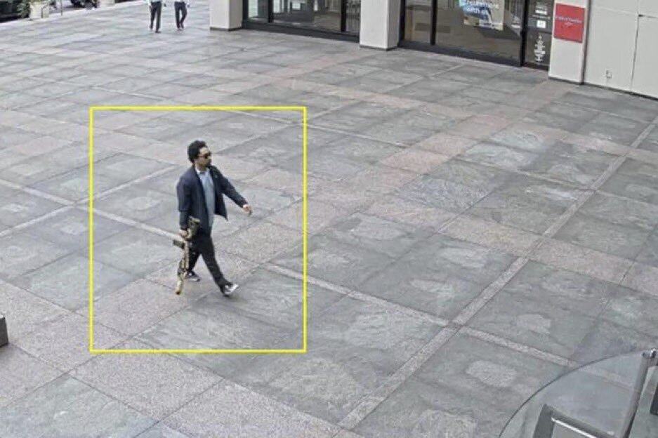 Shane Tamura is seen in a surveillance video outside the NFL office building on Monday. Photo: AP