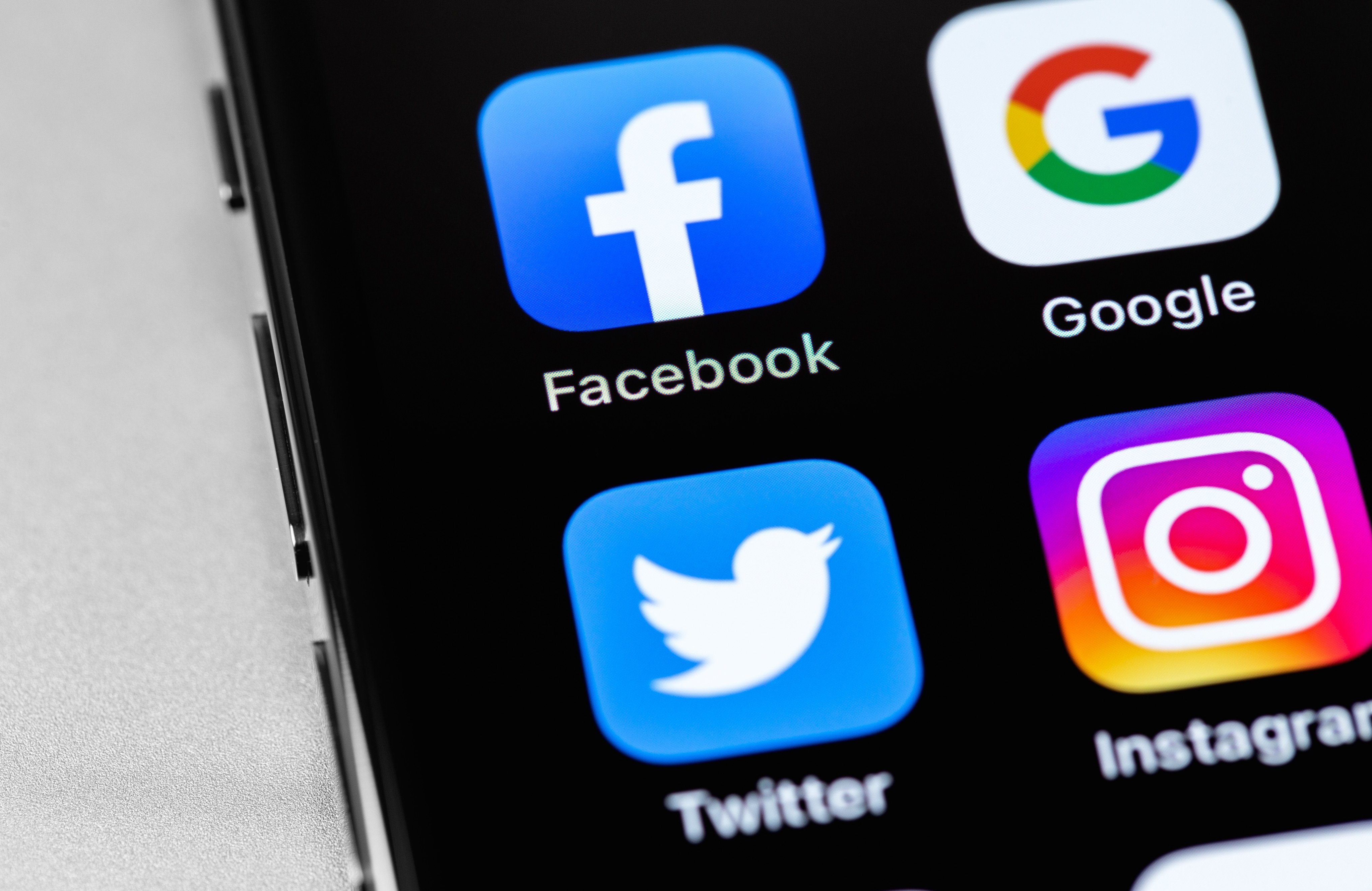 Social media icon apps on a mobile phone. Malaysia has progressively imposed strict laws on social media. Photo: Shutterstock