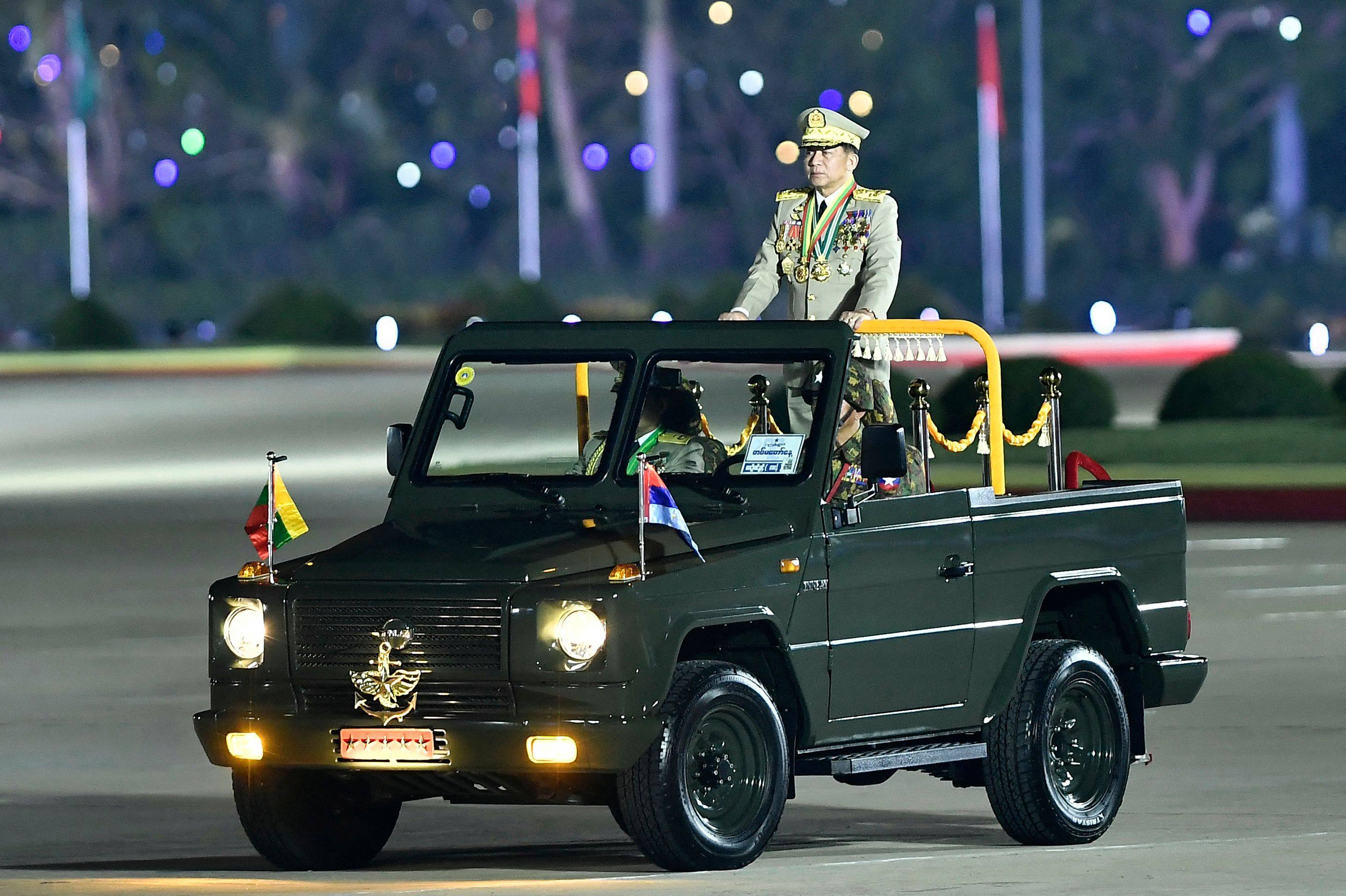 Myanmar’s junta chief military Min Aung Hlaing arrives at a ceremony in Naypyidaw last March. Analysts predict he will keep a role as either president or armed forces chief. Photo: AFP