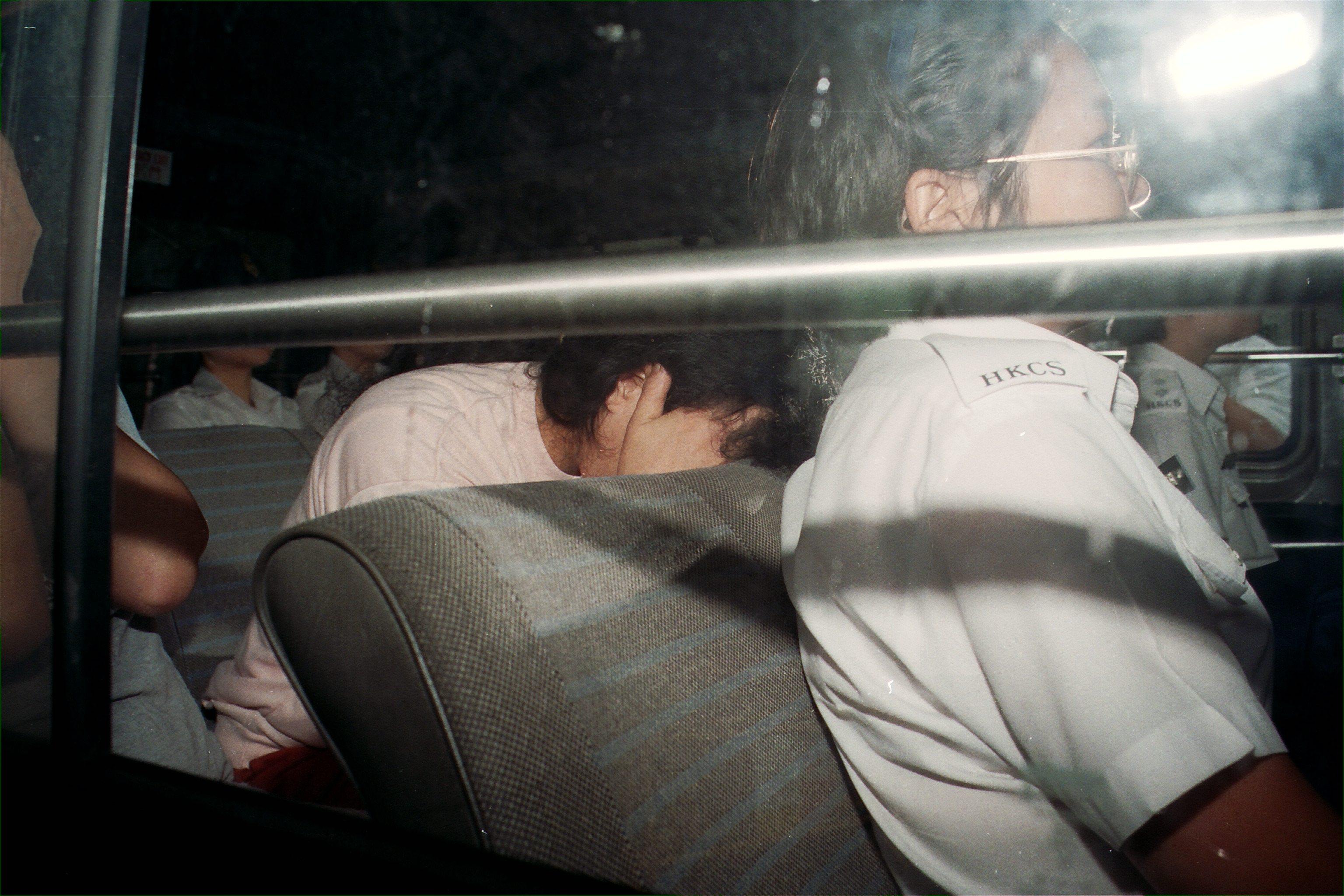 Co-defendant Phoebe Wong Yim-ping is taken away in a prison van following her sentencing for her part in killing Elaine Luk Yee-ling in 1994. Photo: SCMP Archives