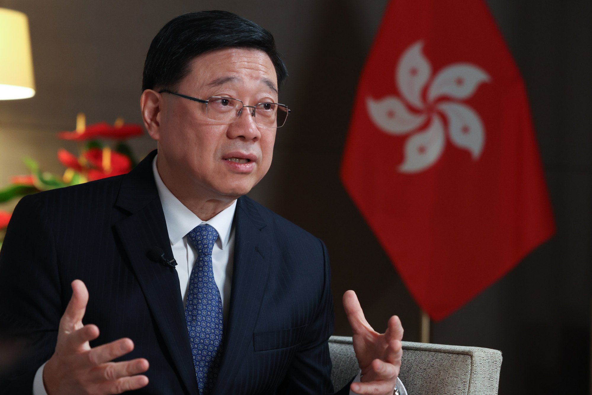 Chief Executive John Lee has pledged to examine global regulatory trends. Photo: Dickson Lee Chief Executive John Lee has pledged to examine global regulatory trends. Photo: Dickson Lee