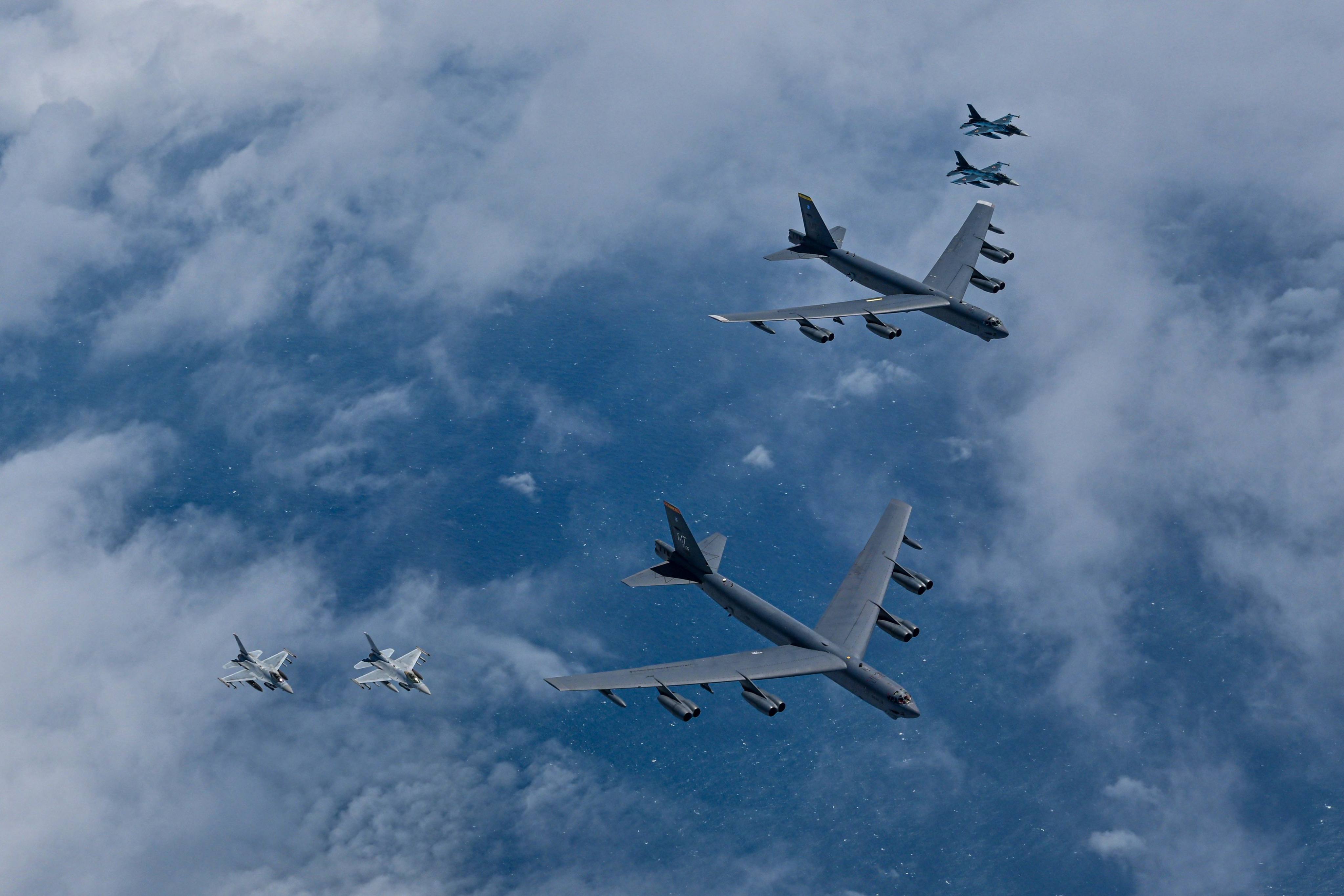 On July 11, US Air Force B-52H bombers, South Korean Air Force KF-16 fighter jets and Japanese Air Self-Defence Force F-2 fighter jets take part  a joint air drill over international waters off South Korea’s southern island of Jeju. Photo: South Korean Defence Ministry/AFP