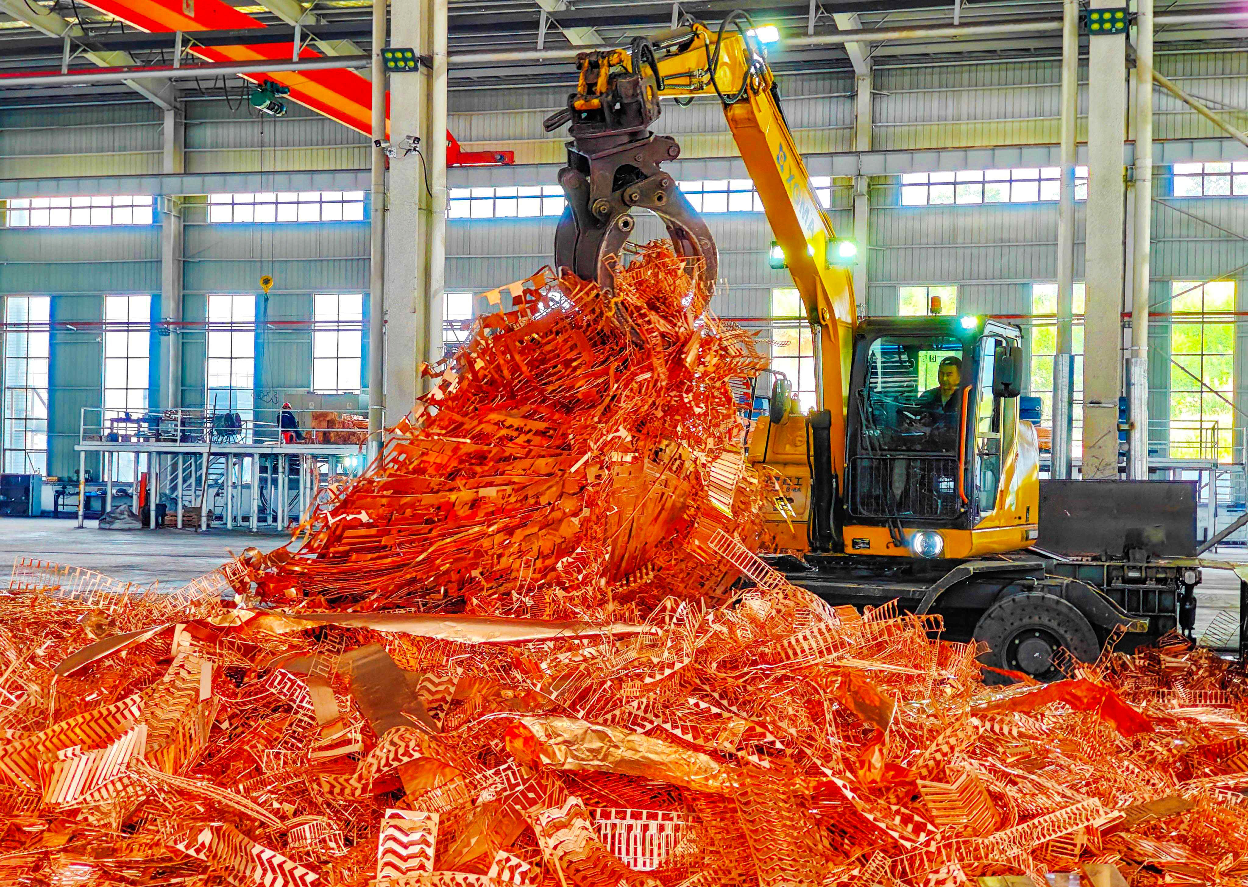 Scrap copper is prepared for recycling at a workshop in China’s Anhui province on July 11. Photo: AFP