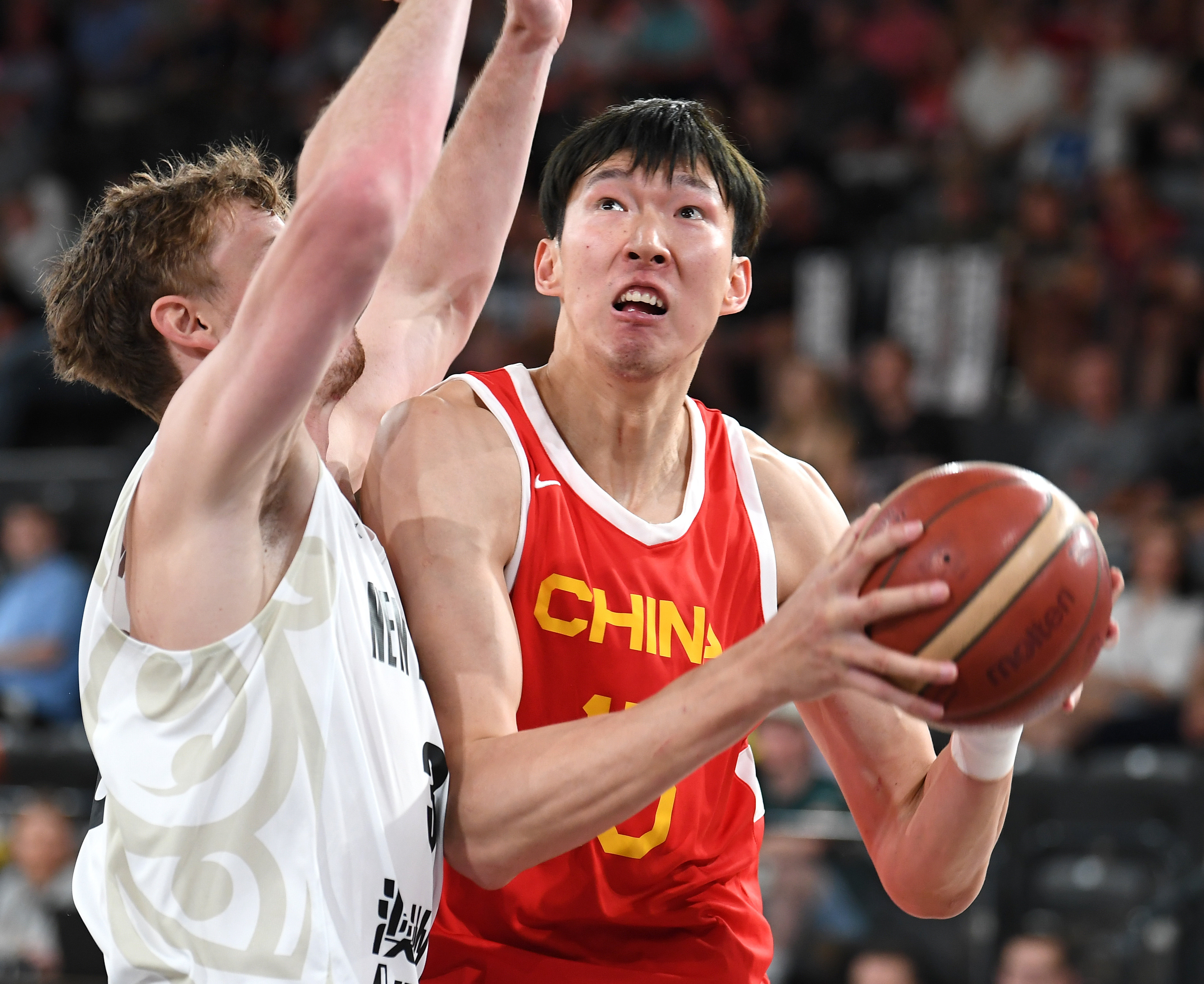 Qi Zhou Qi (right) will miss China’s coming Fiba Asia Cup campaign after opting to undergo rehabilitation. Photo: Xinhua
