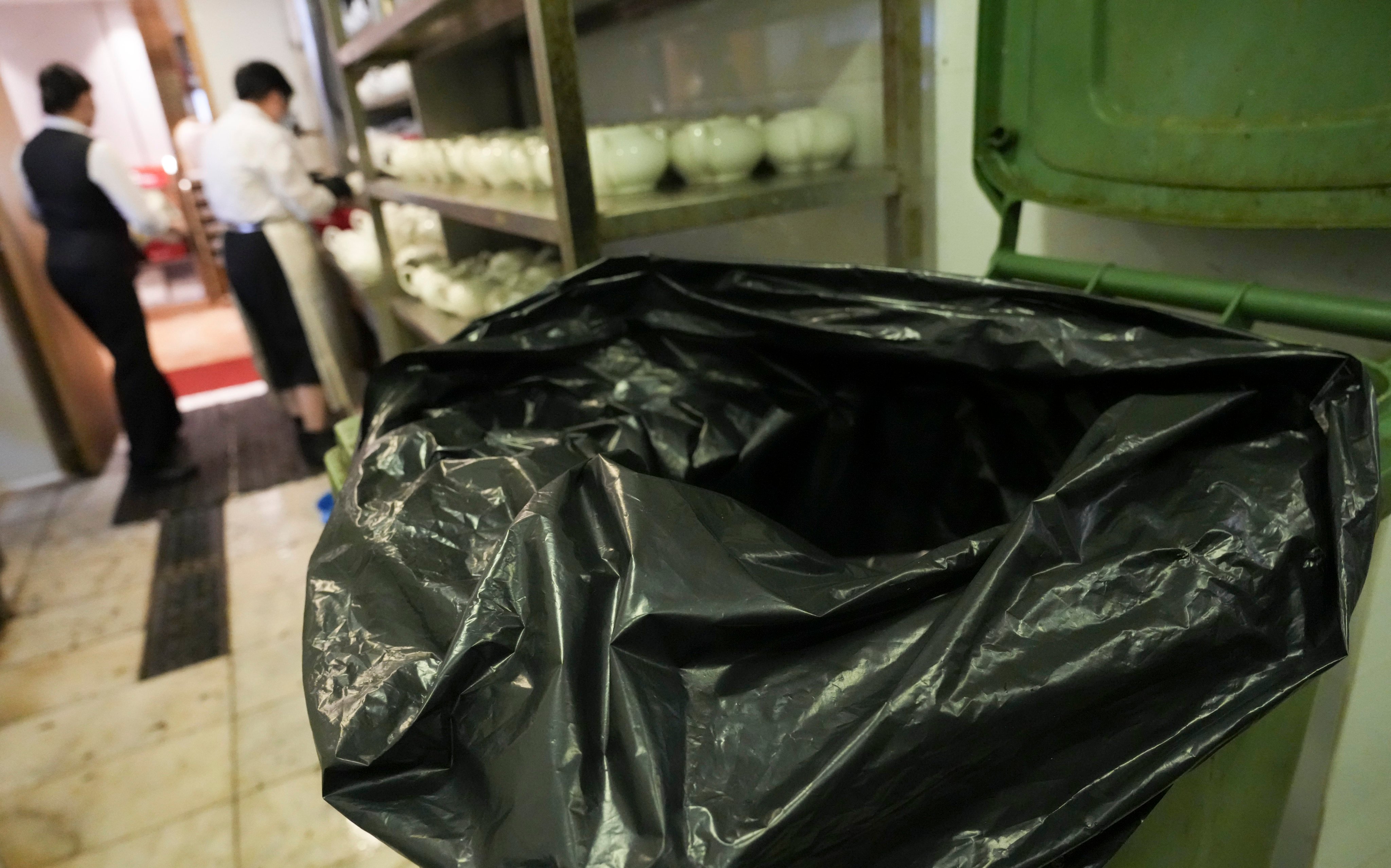 A dustbin is lined in a restaurant in San Po Kong in 2024. Many food businesses often find donation more costly and complicated than disposal and consequently, perfectly edible food goes to landfills rather than to people in need. Photo: May Tse