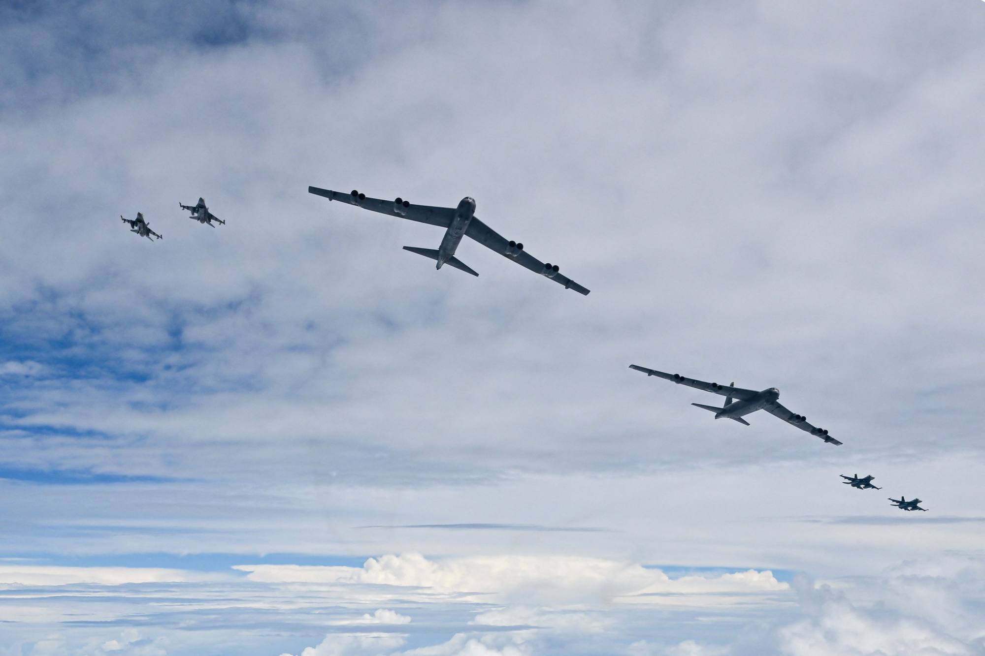 US B-52 bombers and South Korean KF-16 fighters jets fly in formation with Japanese warplanes during a joint air drill on July 11. Photo: South Korean Defence Ministry/AFP US B-52 bombers and South Korean KF-16 fighters jets fly in formation with Japanese warplanes during a joint air drill on July 11. Photo: South Korean Defence Ministry/AFP