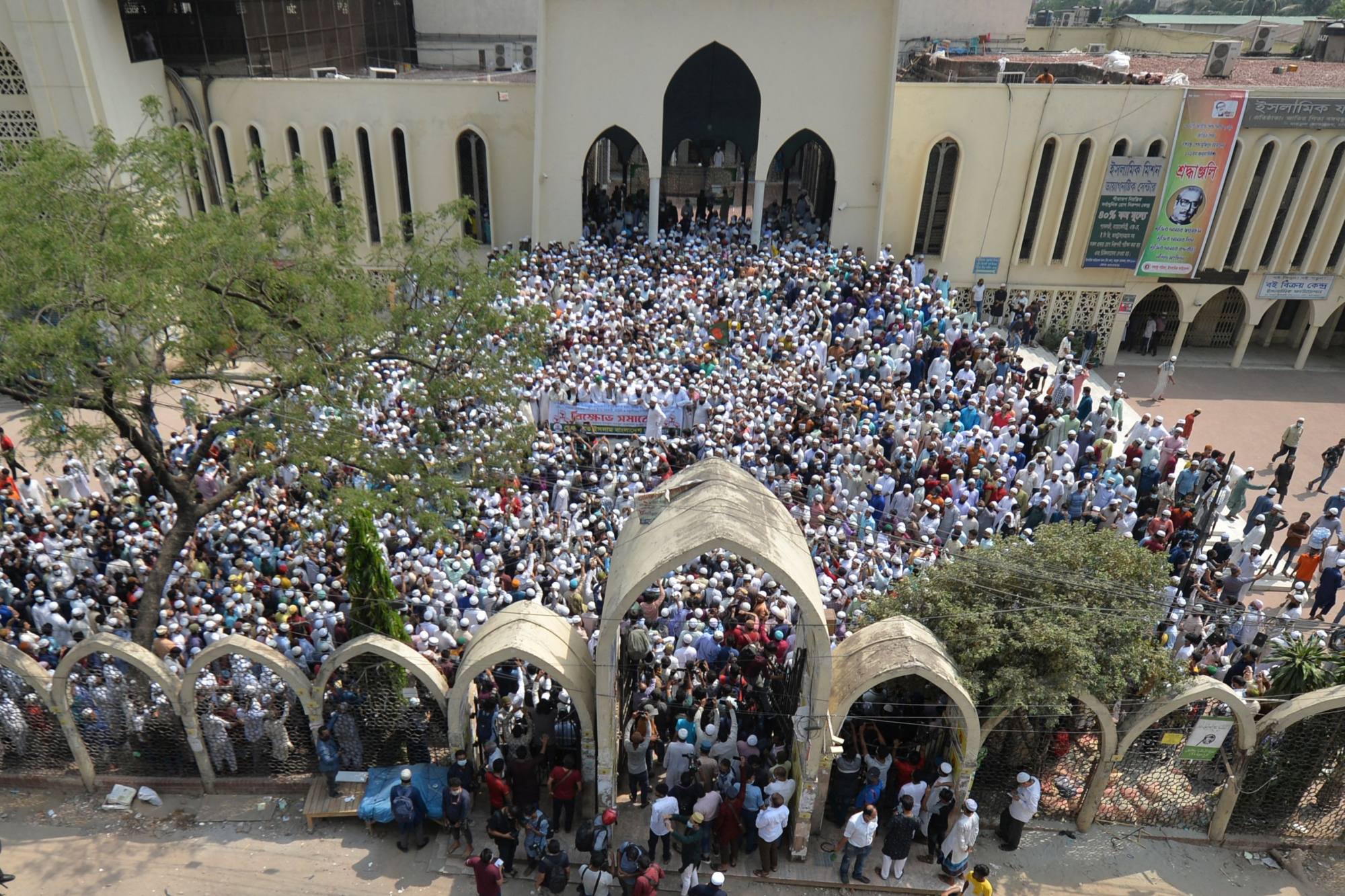 Activists of the Hefazat-e Islam protest outside the national mosque in Dhaka in April 2021. Hardline Islamist groups are organising mass rallies, tapping up rural strongholds and shaping public discourse through mosques and madrasas. Photo: AFP