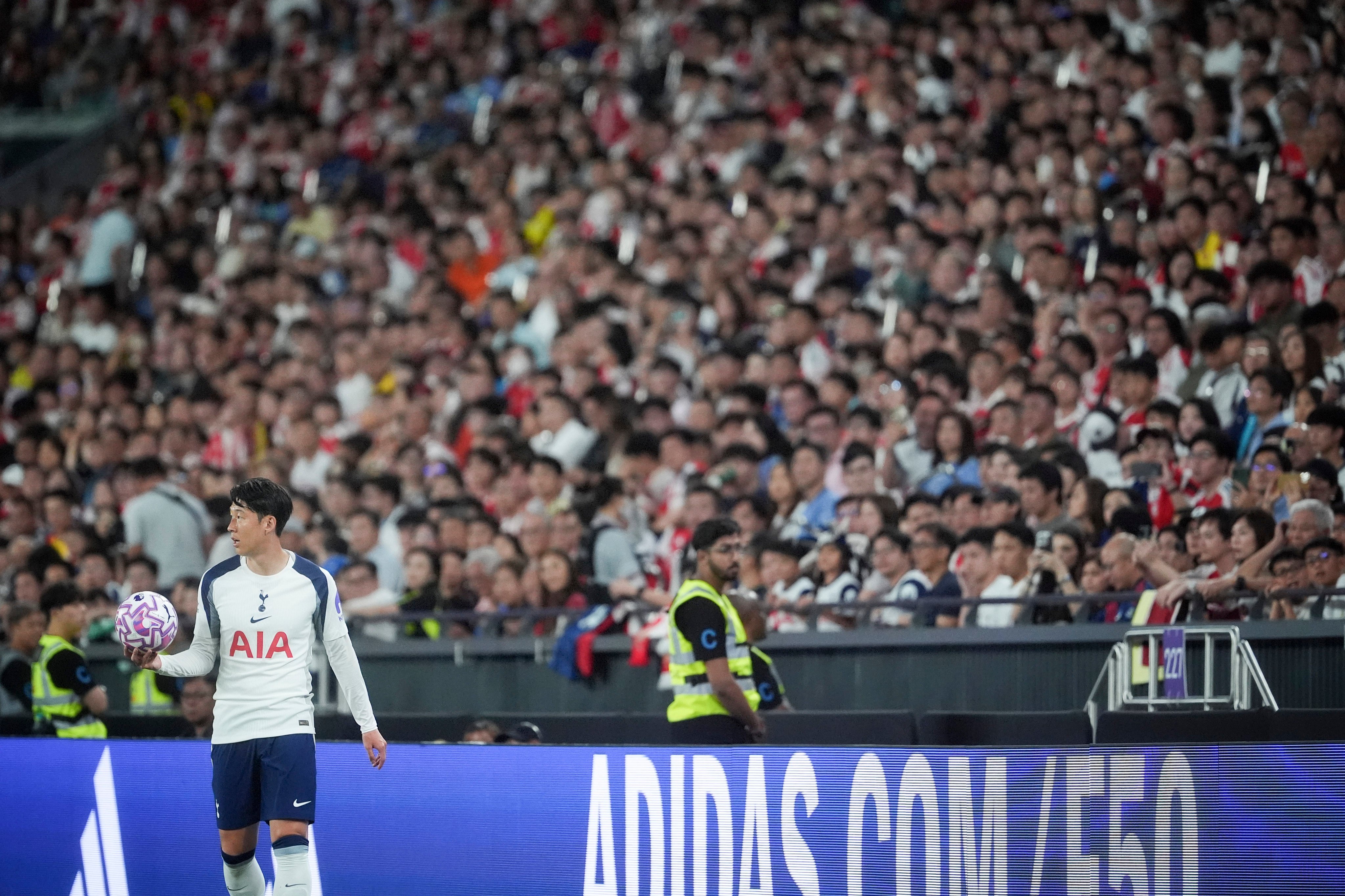 Tottenham Hotspur’s Son Heung-min prepares to take a throw in during his side’s Herbalgy Trophy clash against Arsenal at Kai Tak Stadium. Photo: Elson Li