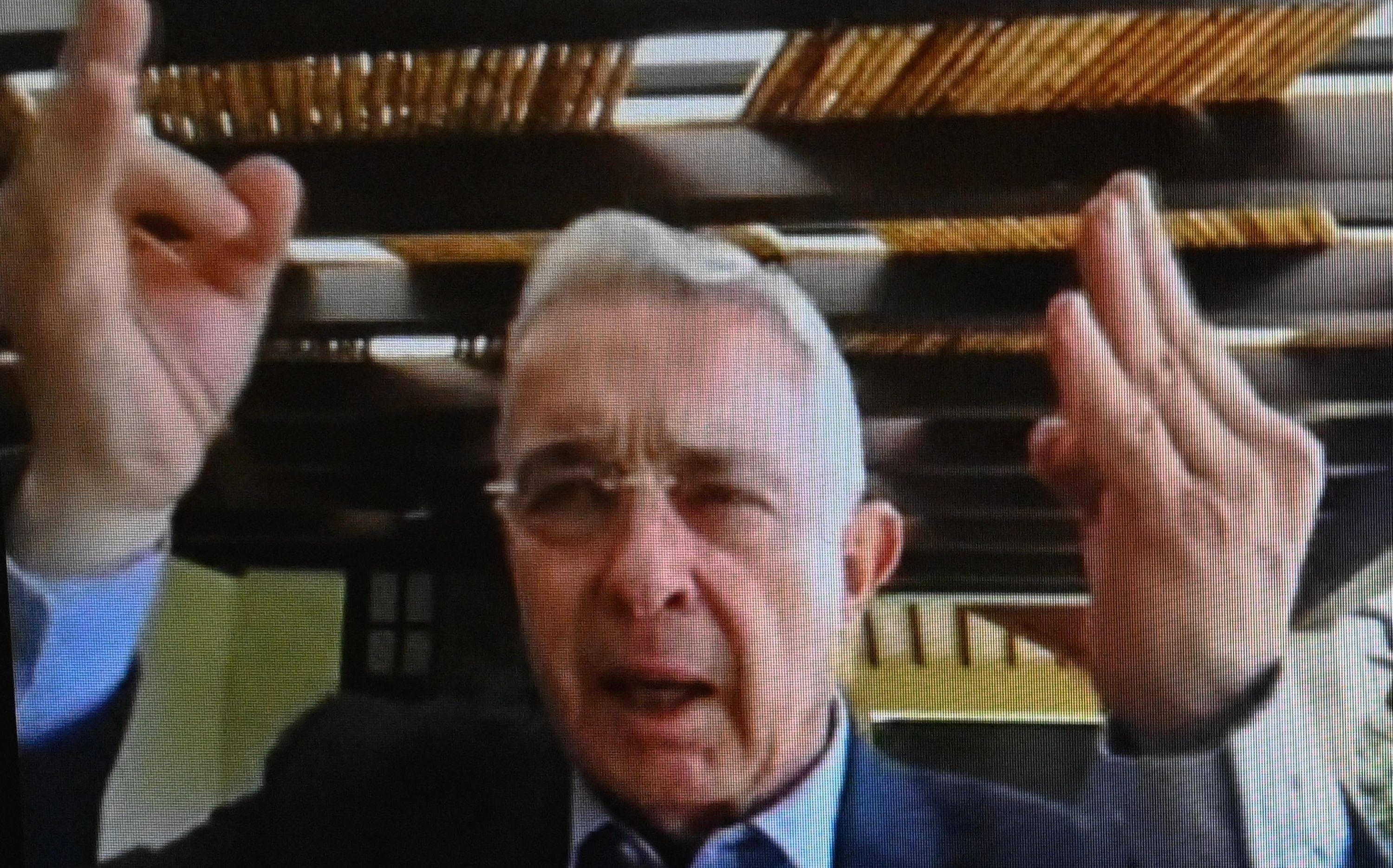 A screen grab from a live broadcast shows Colombian former president Alvaro Uribe gesturing during his sentencing hearing in Bogotá on Friday. Photo: Juzgados Especializados de Paloquemao via AFP