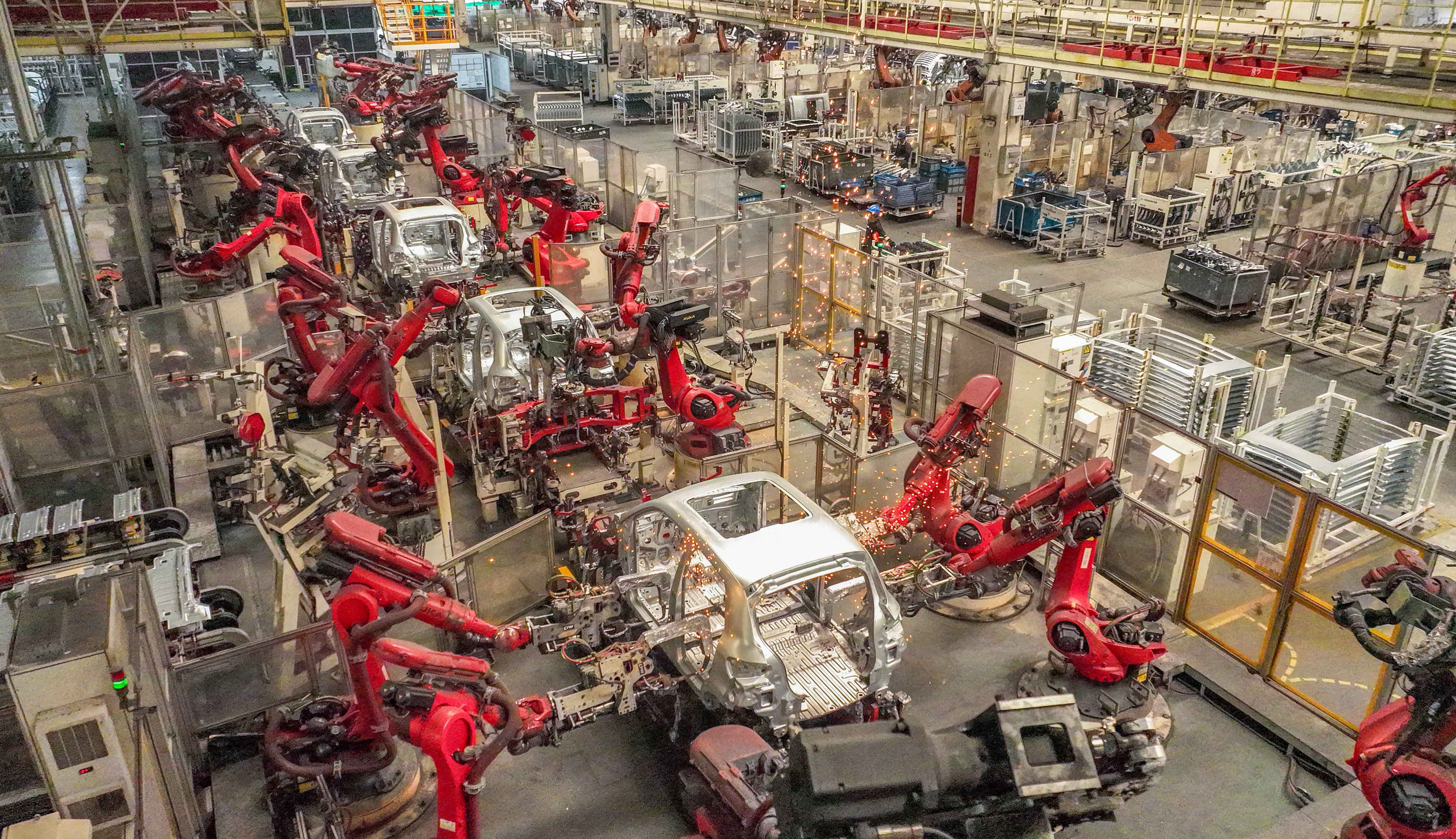Robotic arms work at an intelligent factory of  Leapmotor in Jinhua, Zhejiang province, on July 16, 2025. Photo: VCG via Getty Images