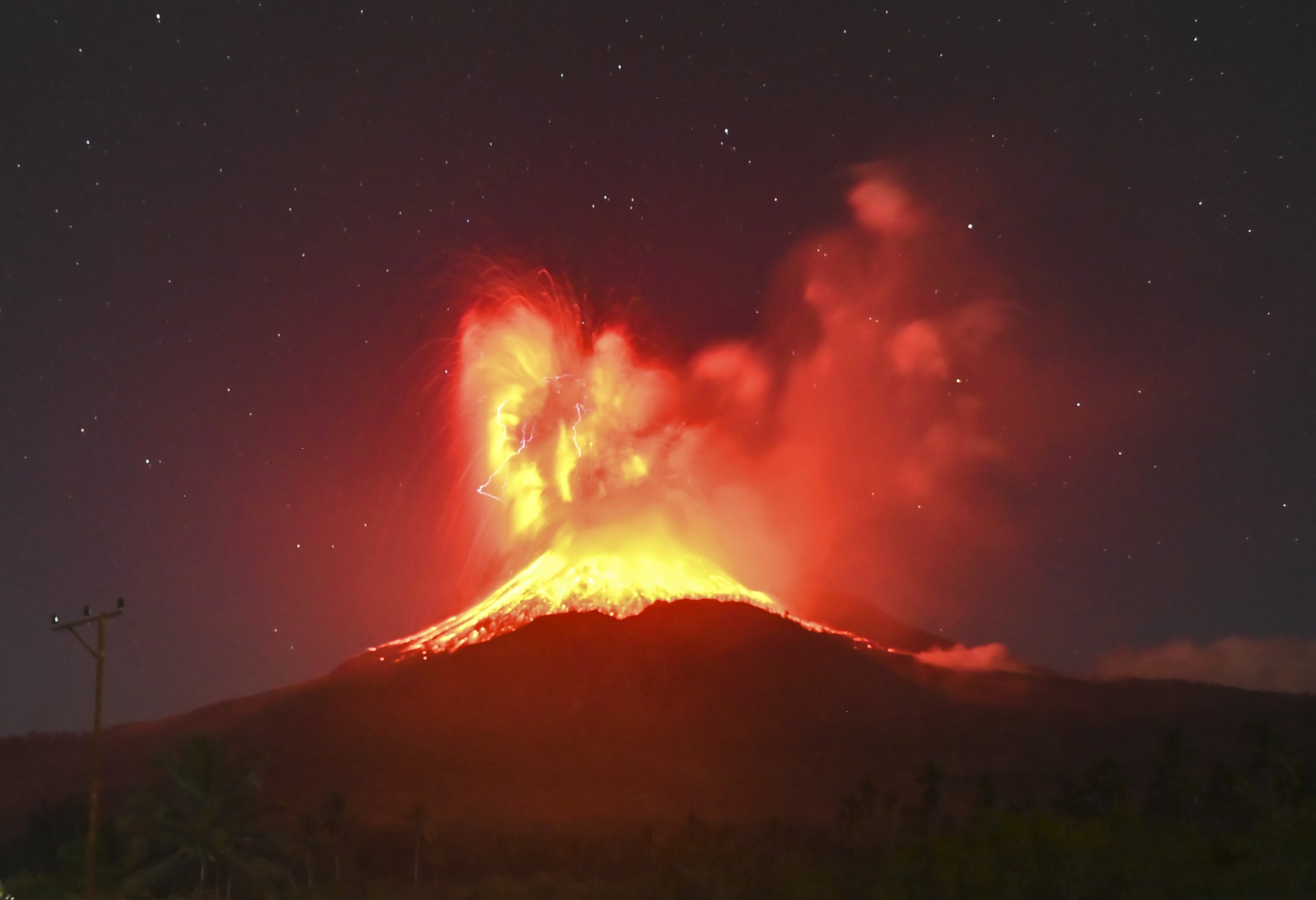 The Lewotobi Laki Laki volcano spewing volcanic materials during an eruption in East Flores, East Nusa Tenggara province, Indonesia, on Friday. Photo: EPA