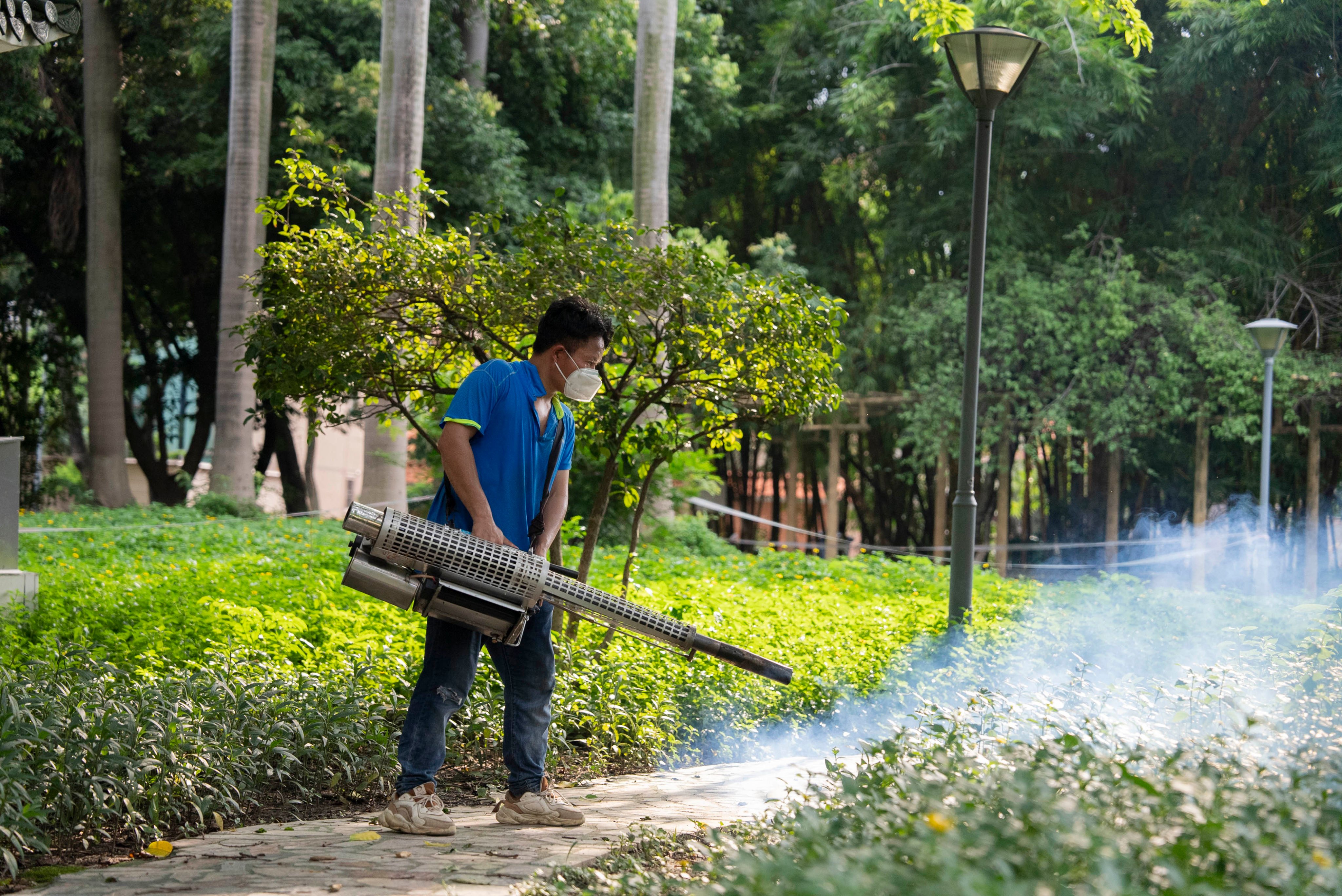 A staff member carries out disinfection work at a hospital amid an outbreak of chikungunya fever in Foshan. Photo: VCG/VCG via Getty Images