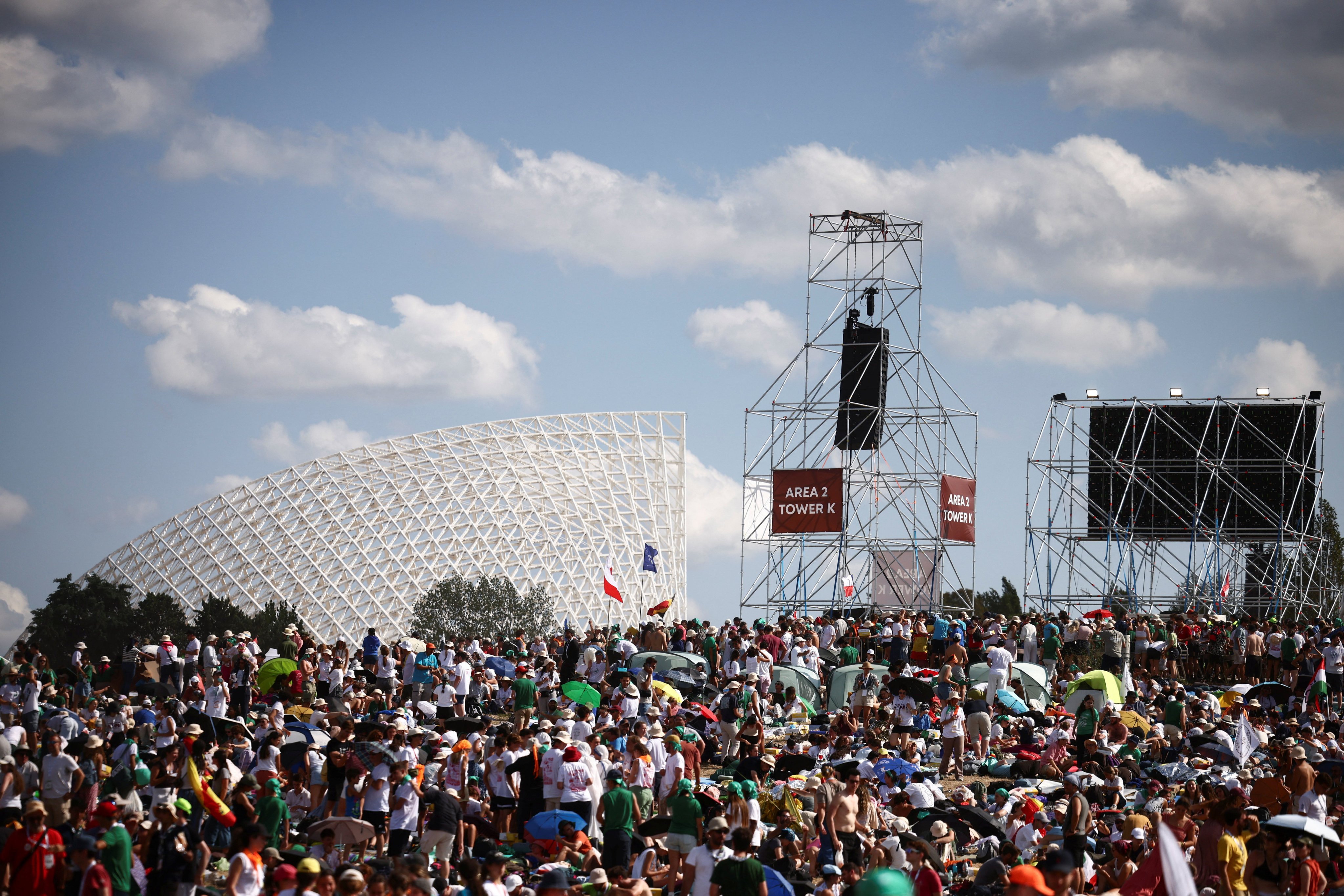 Faithful wait at the venue in Tor Vergata, Rome, Italy on Saturday for Pope Leo to attend a vigil for the Jubilee of Youth. Photo: Reuters