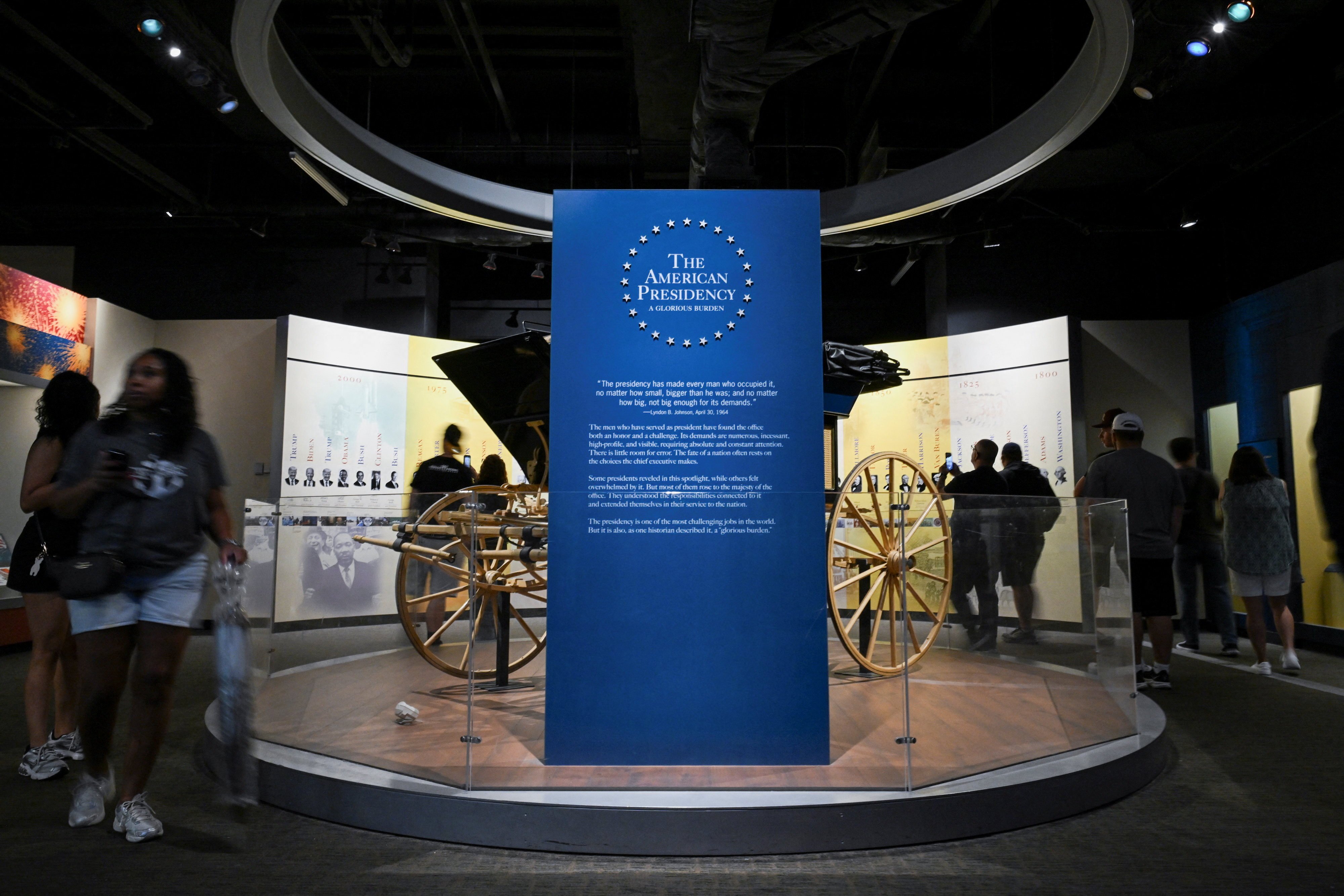 Visitors walk past a sign for “The American Presidency: A Glorious Burden” exhibition inside the Smithsonian’s National Museum of American History in Washington on Saturday. Photo: Reuters