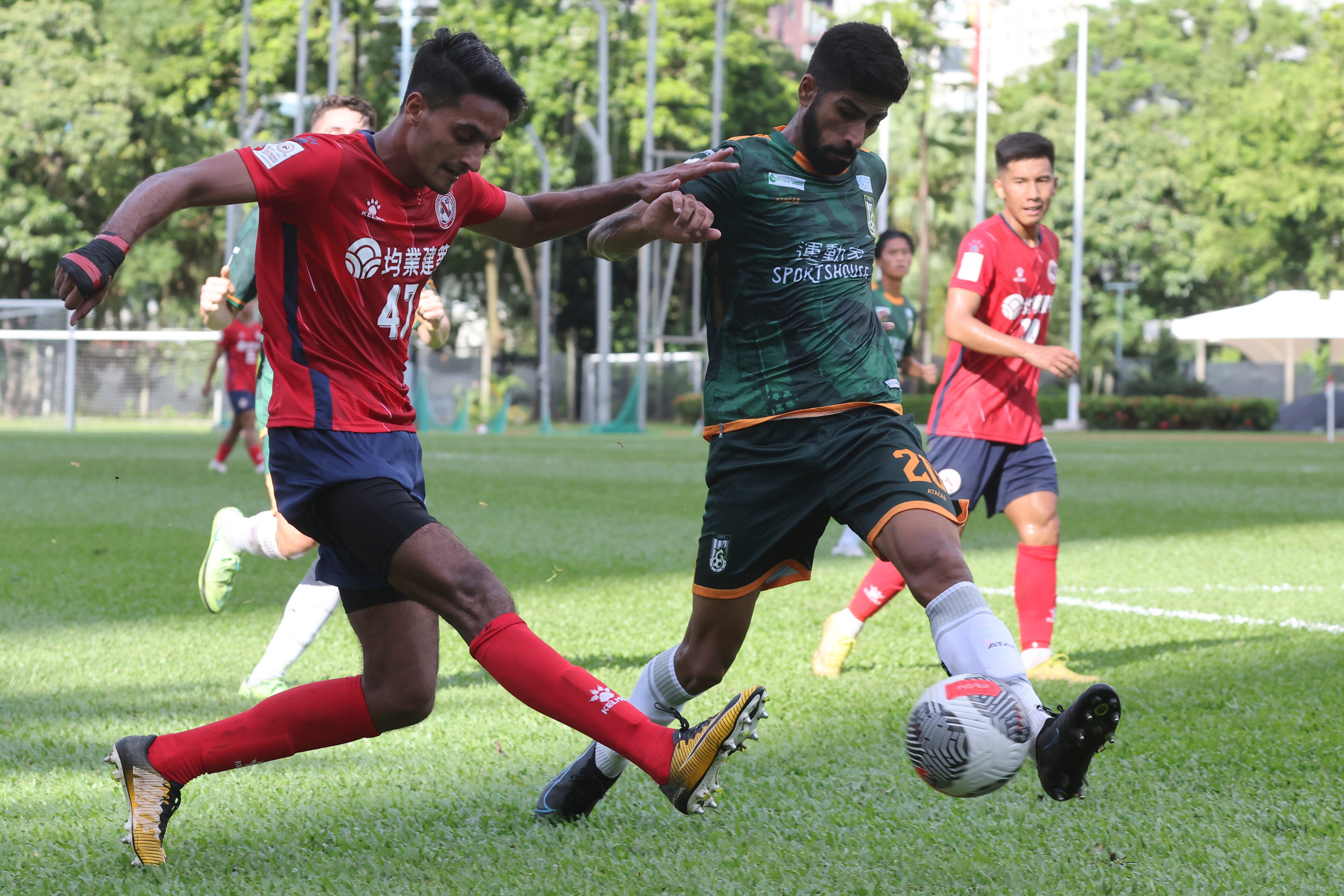Naveed Khan (left) in action for North District against Sham Shui Po in 2023. Photo: Edmond So