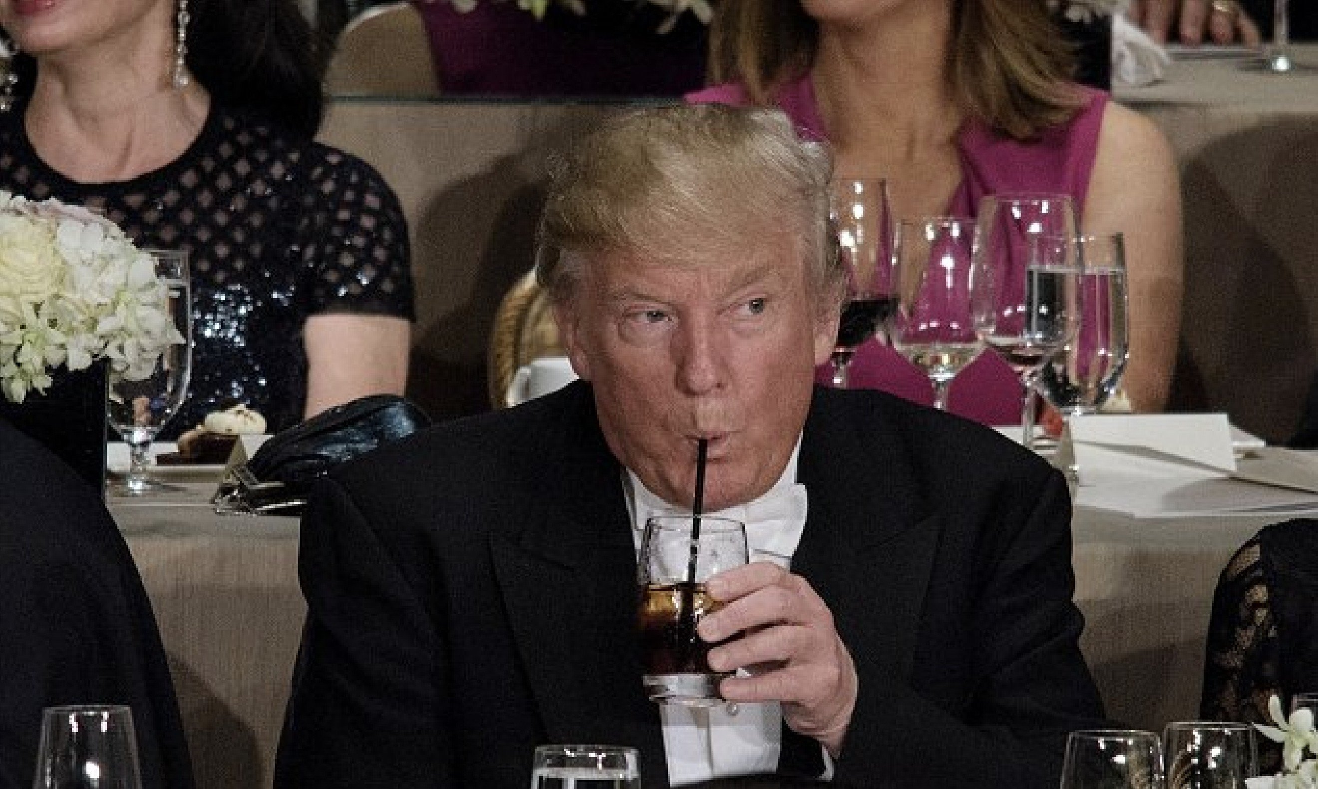 Donald Trump drinks a Diet Coke at the Al Smith Memorial Foundation Dinner in New York in 2016. BRENDAN SMIALOWSKI/AFP via Getty Images