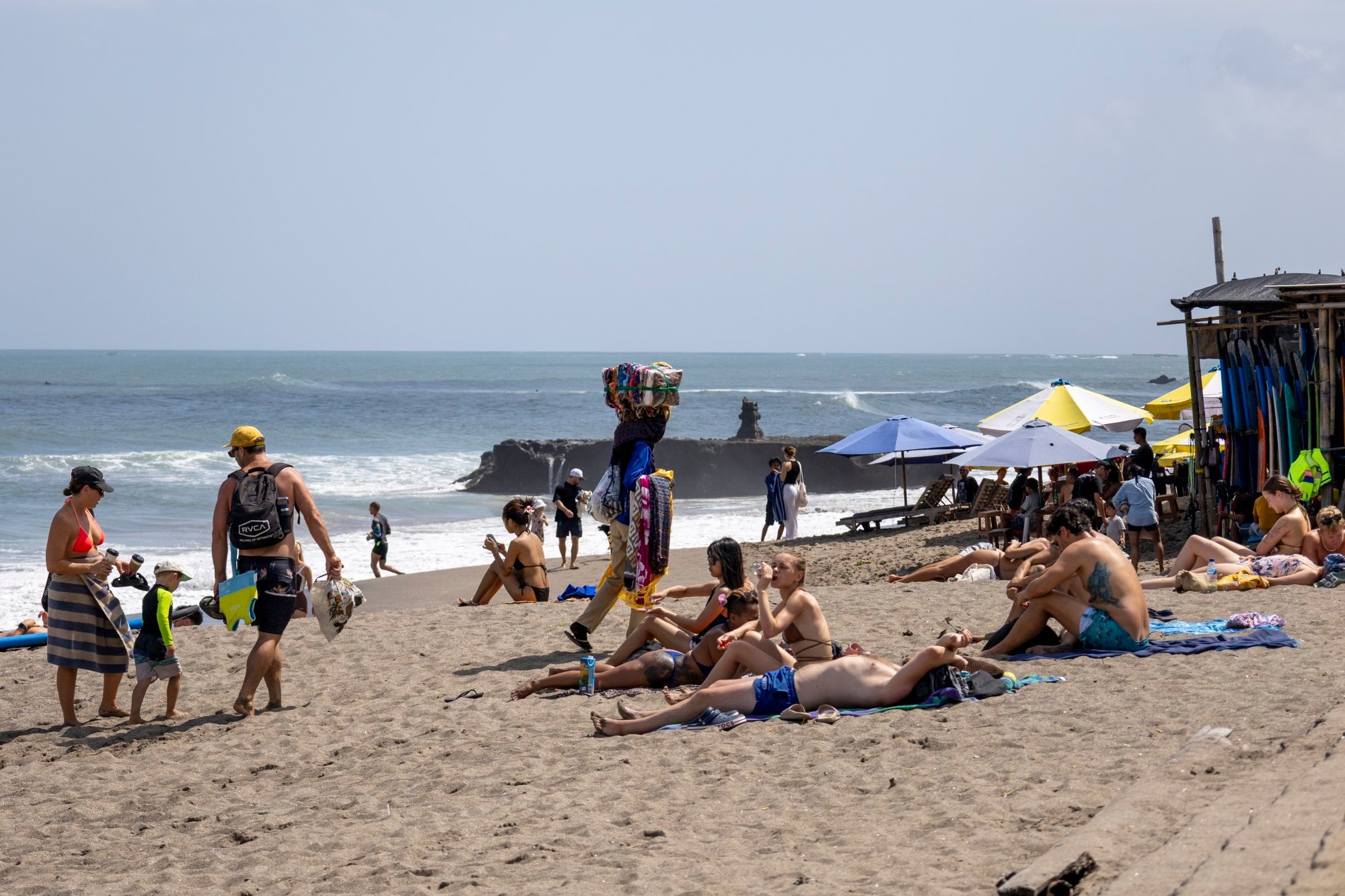 Tourists at a beach in Canggu, Bali. Passenger levels in the airline industry have largely recovered from the impact of the Covid-19 pandemic, according to analysts. Photo: EPA