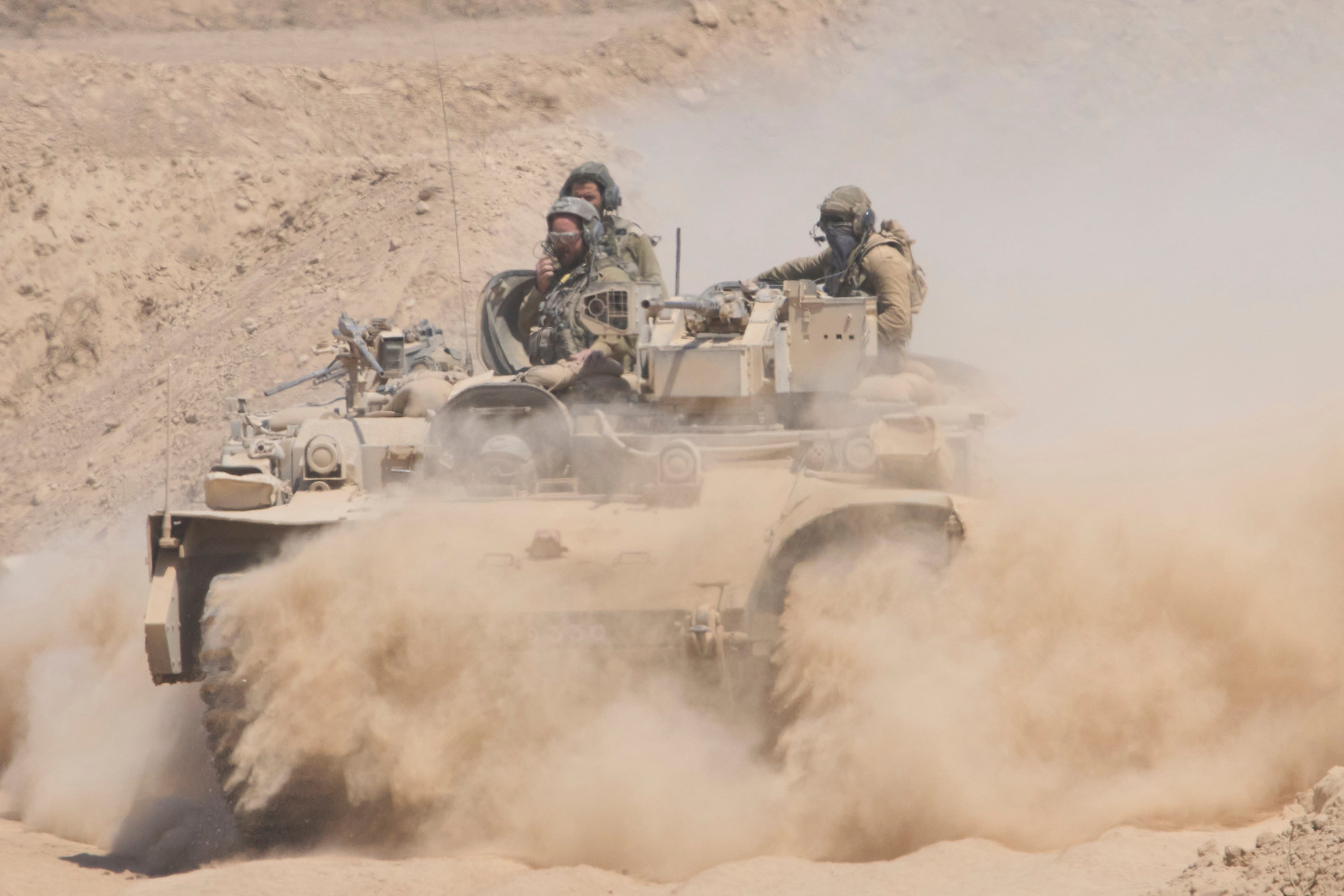 Israeli soldiers on an armored personnel carrier. Photo: AP