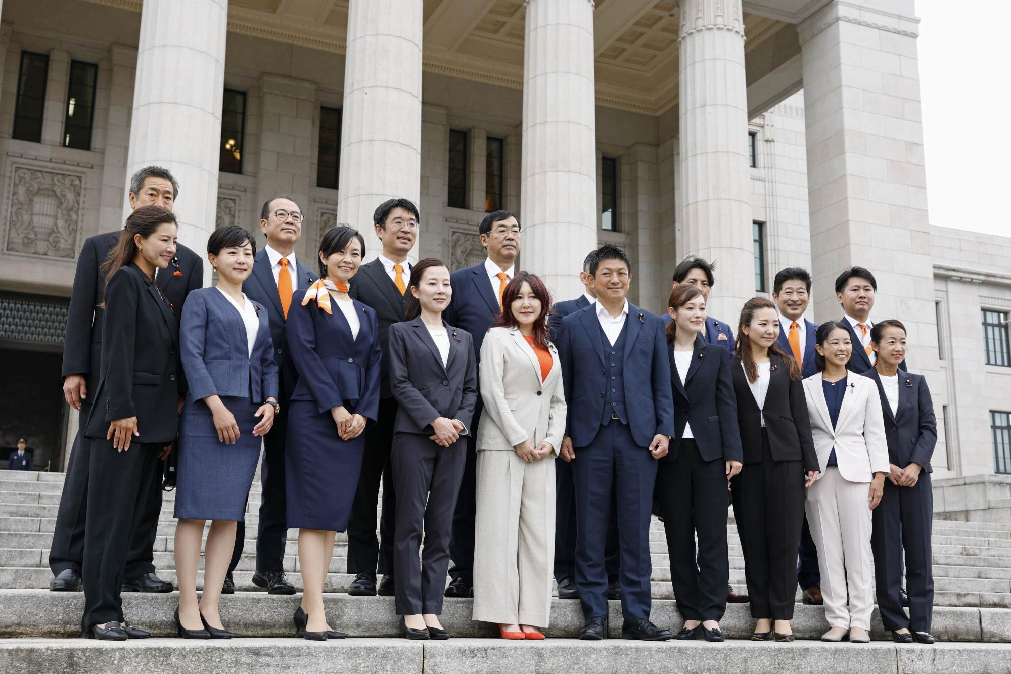 Lawmakers of the Sanseito party pose for a photo in front of the Diet building in Tokyo on Friday. The far-right opposition party has gone from two to 15 seats in the 248-member upper house of Japan’s parliament. Photo: Kyodo Lawmakers of the Sanseito party pose for a photo in front of the Diet building in Tokyo on Friday. The far-right opposition party has gone from two to 15 seats in the 248-member upper house of Japan’s parliament. Photo: Kyodo