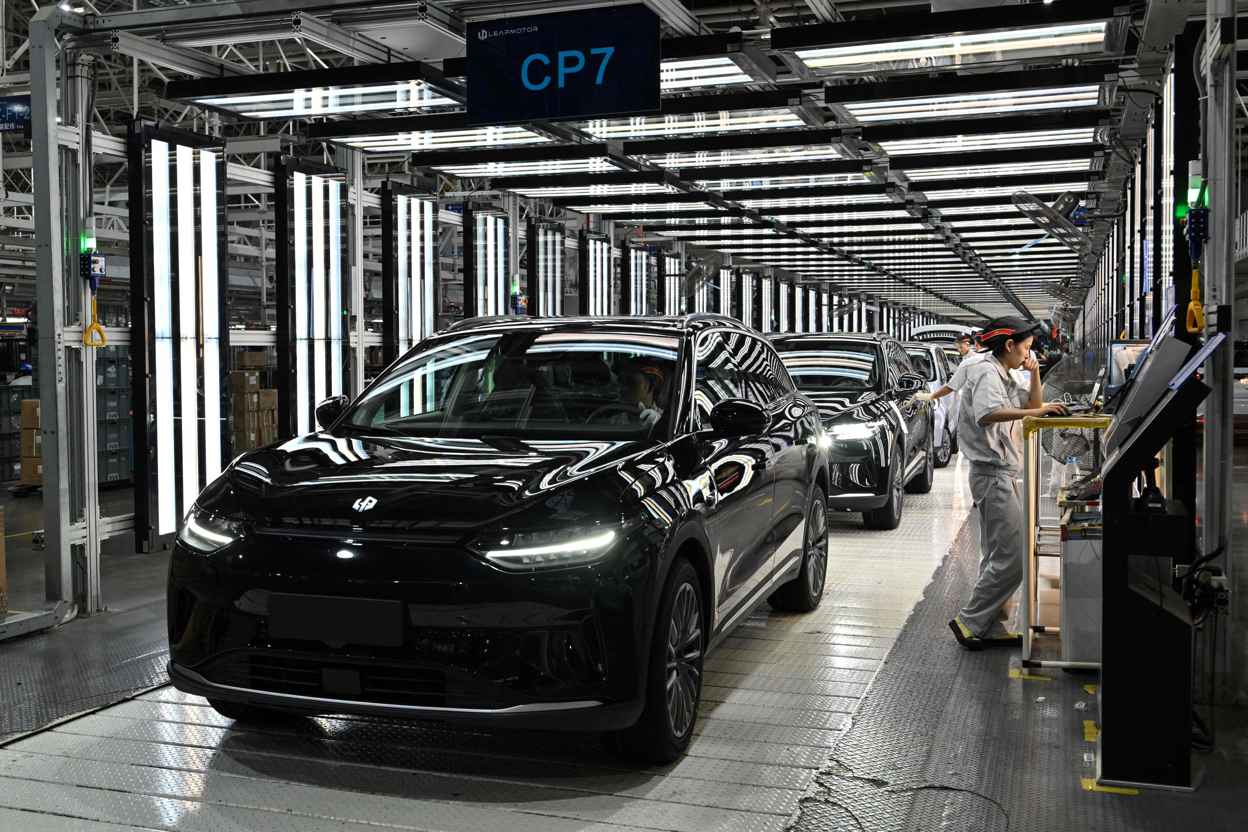Electric cars move along a production line at a factory run by the Chinese brand Leapmotor in Jinhua, eastern China. Concerns that growing competition from China could threaten European jobs are on the rise in France. Photo: AFP