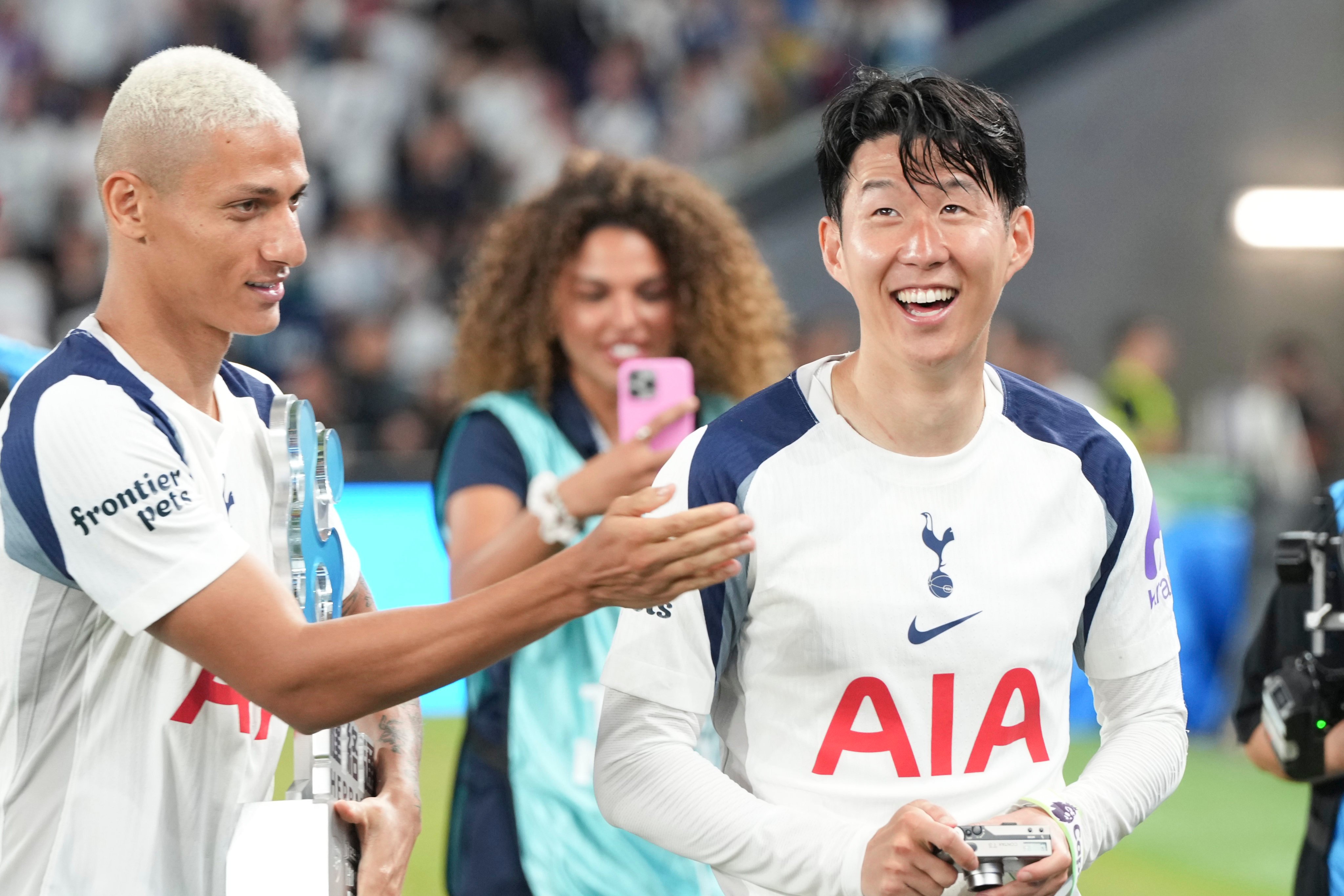 Son Heung-min (right) is applauded by teammate Richarlison after they played against Arsenal in Hong Kong last Thursday. Photo: Sam Tsang