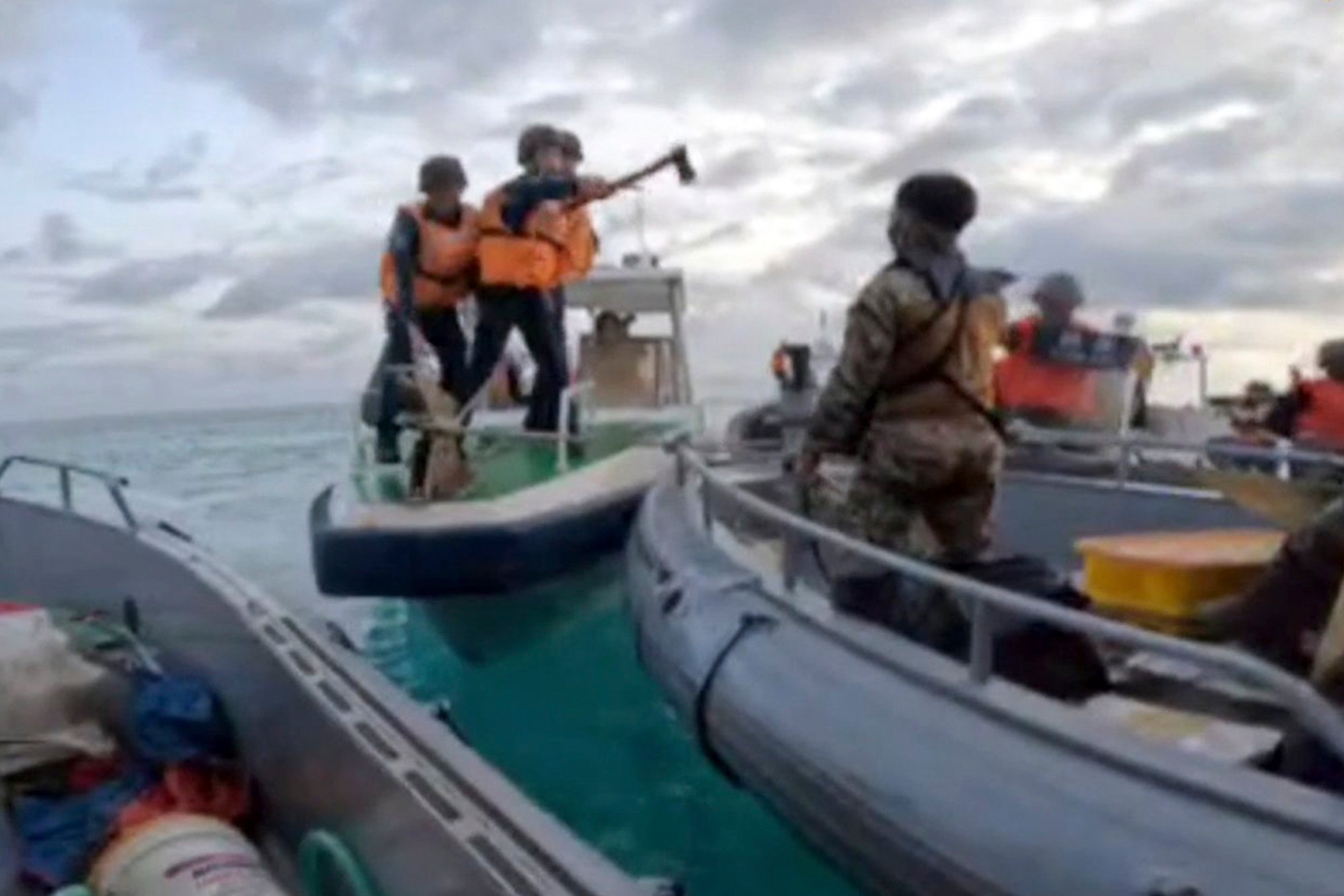 Armed Chinese personnel intercept Philippine troops on a resupply mission to the Second Thomas Shoal on June 17, 2024. Photo: Armed Forces of the Philippines/AP Armed Chinese personnel intercept Philippine troops on a resupply mission to the Second Thomas Shoal on June 17, 2024. Photo: Armed Forces of the Philippines/AP