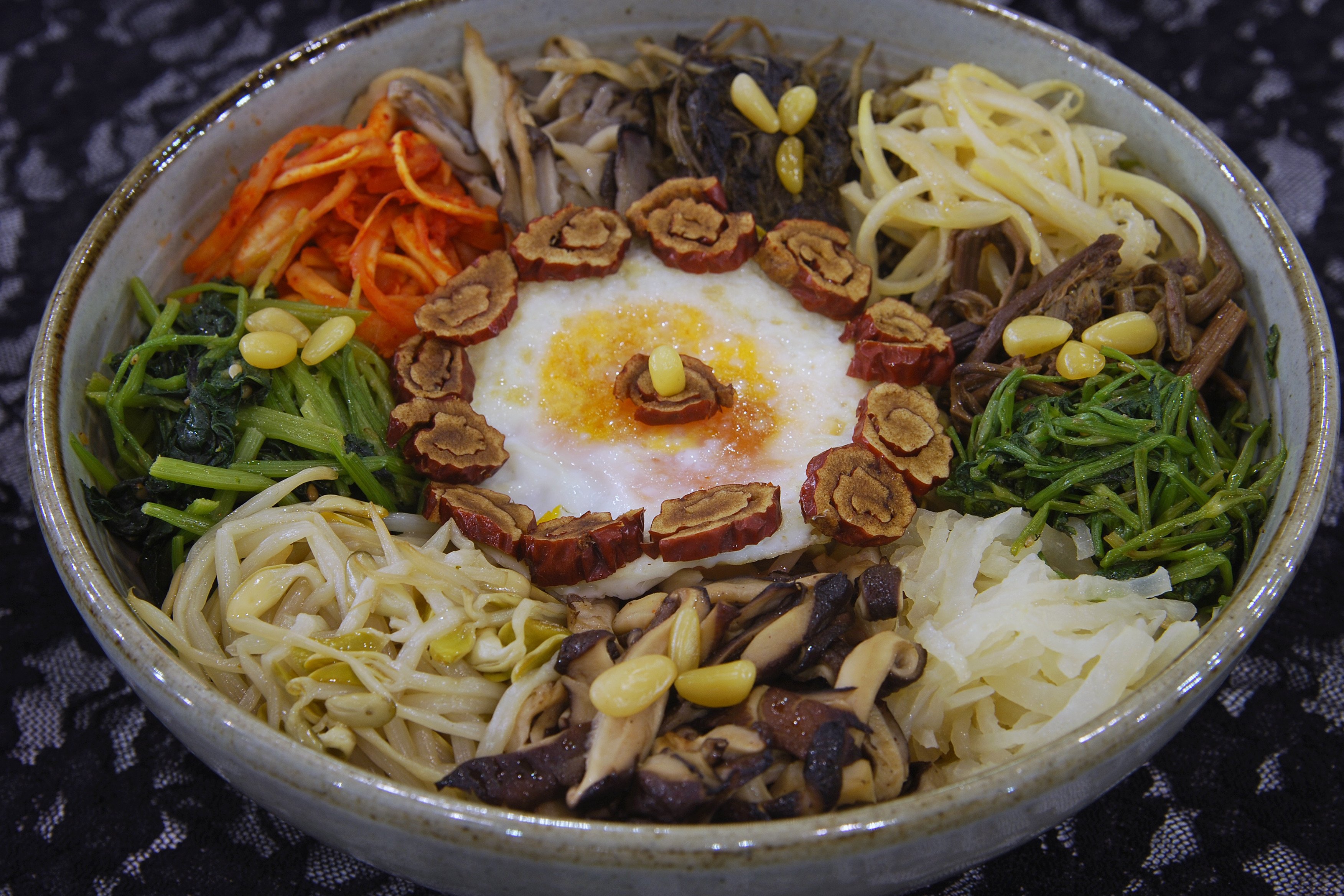 Ingredients in sanchae bibimbap – or wild vegetable bibimbap – can include siraegi (dried radish greens), sweet potato stems, green chilli peppers, dried zucchini slices, dried gourd, radish strips, mushrooms, bracken, royal fern, deodeok (Codonopsis lanceolate), bellflower root and gondre (wild thistle).