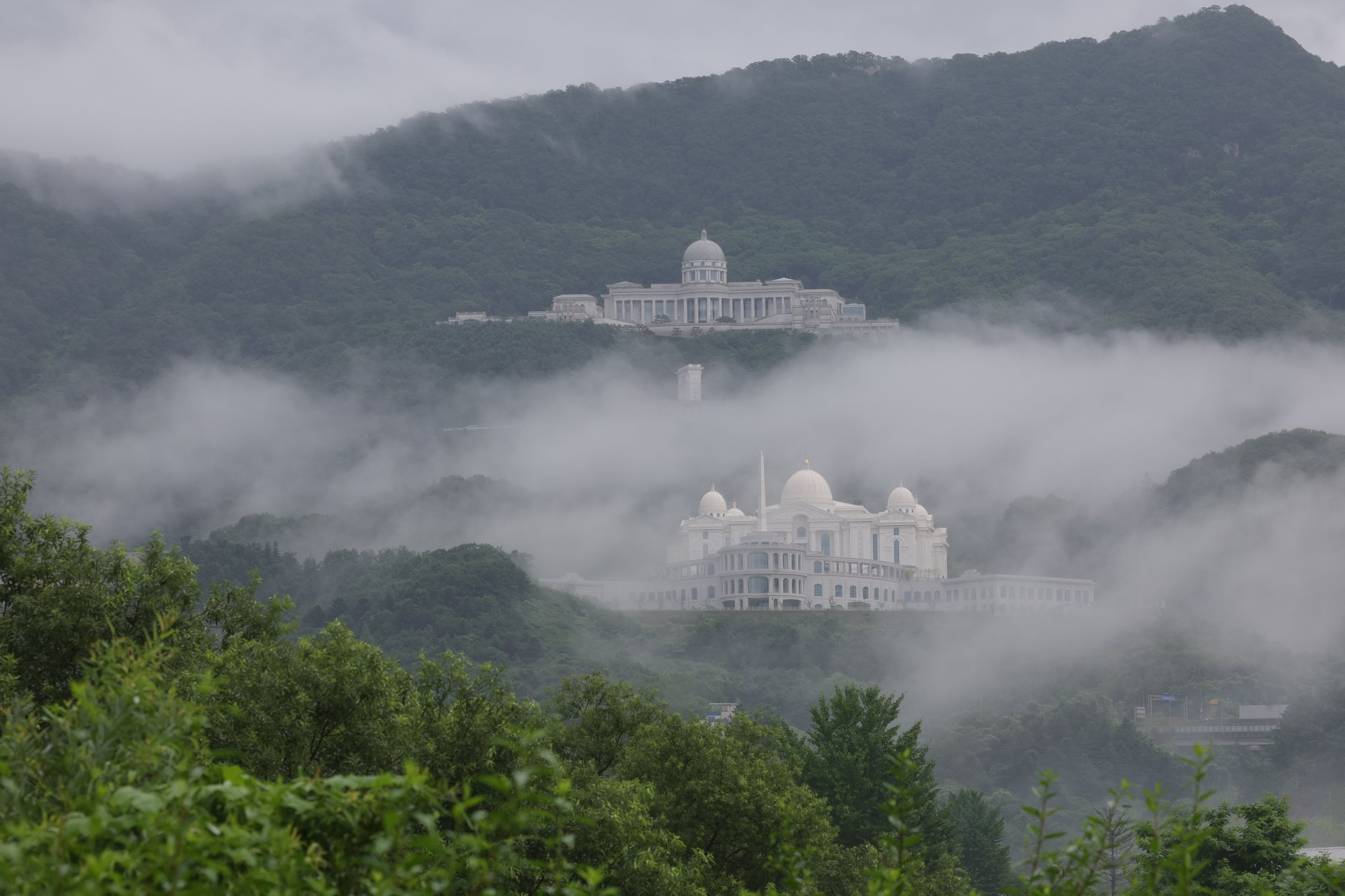 The headquarters of the Unification Church in Gapyeong, South Korea, is seen shrouded by fog last month. Photo: Yonhap/EPA The headquarters of the Unification Church in Gapyeong, South Korea, is seen shrouded by fog last month. Photo: Yonhap/EPA
