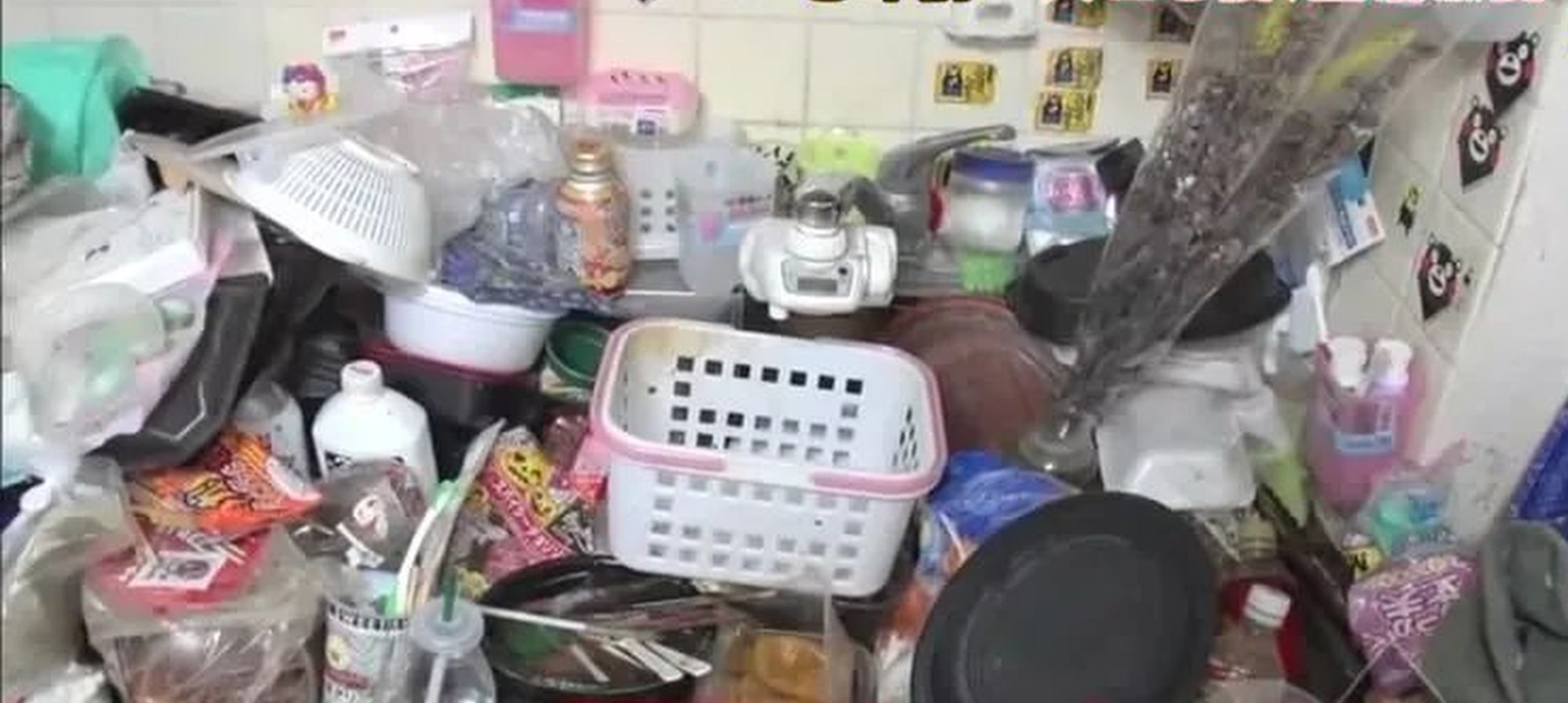 The kitchen of their home resembles a rubbish tip with piles of out-of-date food lying around. Photo: Handout