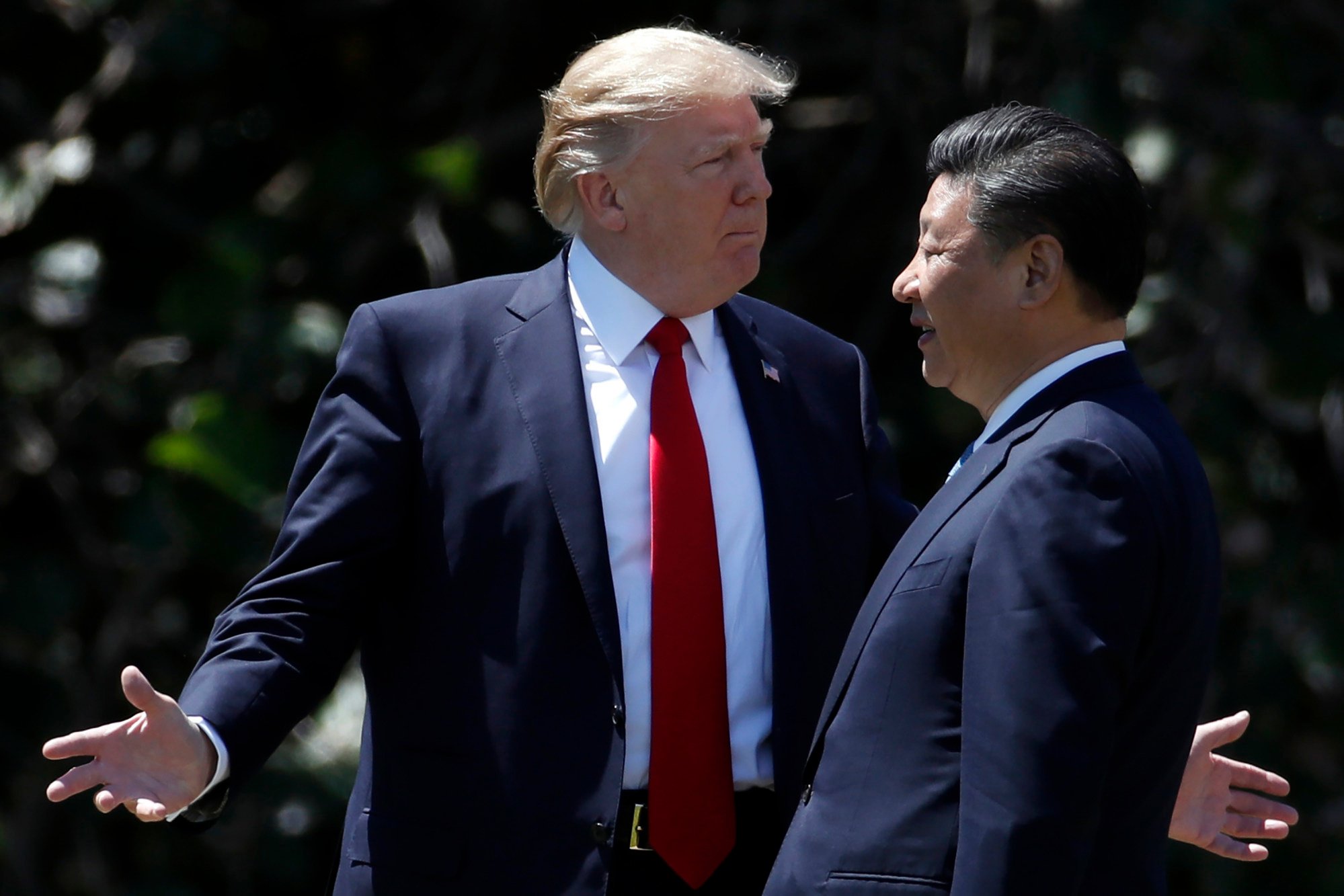 US President Donald Trump and Chinese President Xi Jinping walk together after their meetings at Mar-a-Lago during the first Trump administration. Photo: AP US President Donald Trump and Chinese President Xi Jinping walk together after their meetings at Mar-a-Lago during the first Trump administration. Photo: AP
