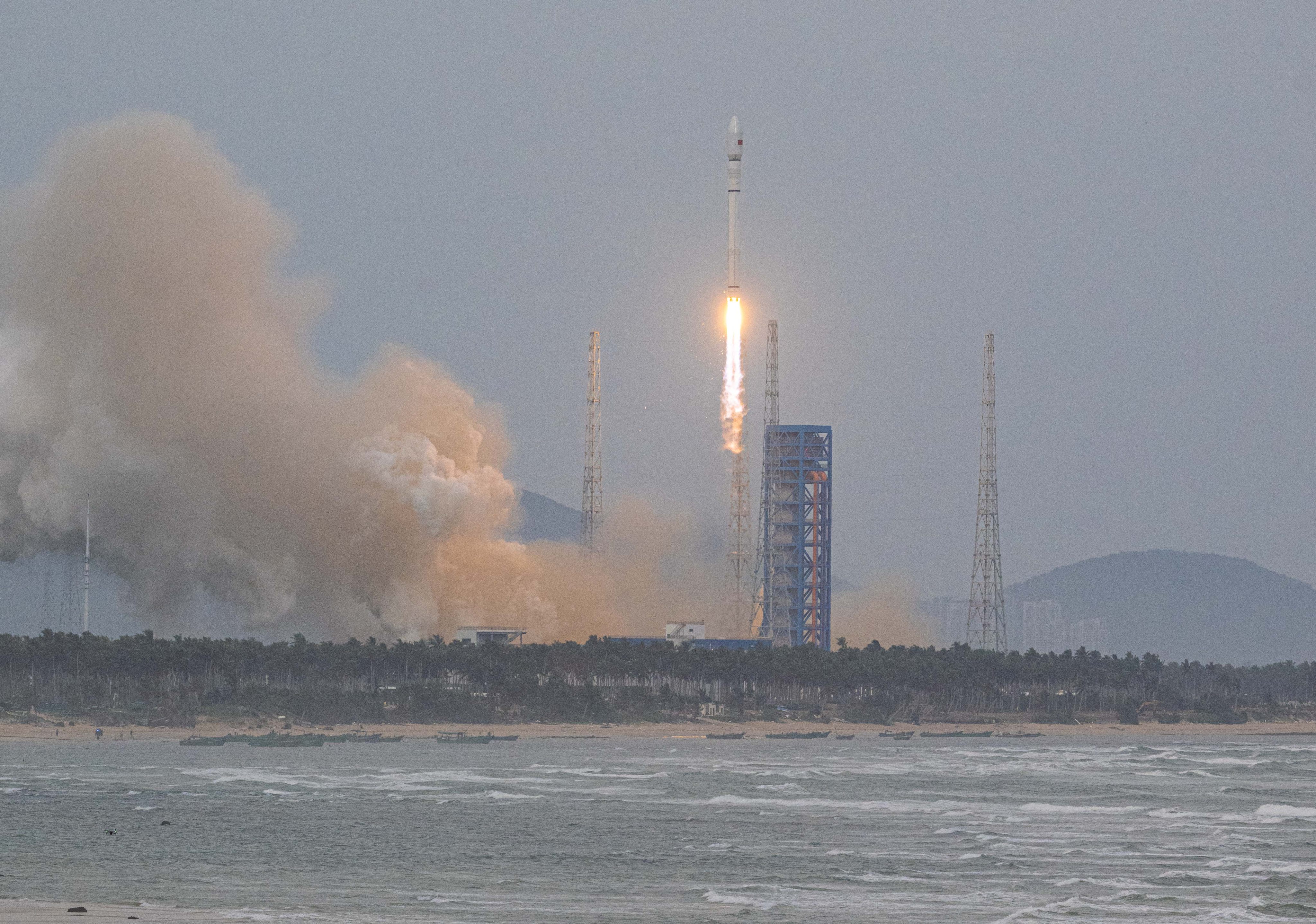 A Long March-12 carrier rocket carrying a group of internet satellites blasts off from the Hainan commercial spacecraft launch site in south China’s Hainan province on Monday. Photo: Xinhua