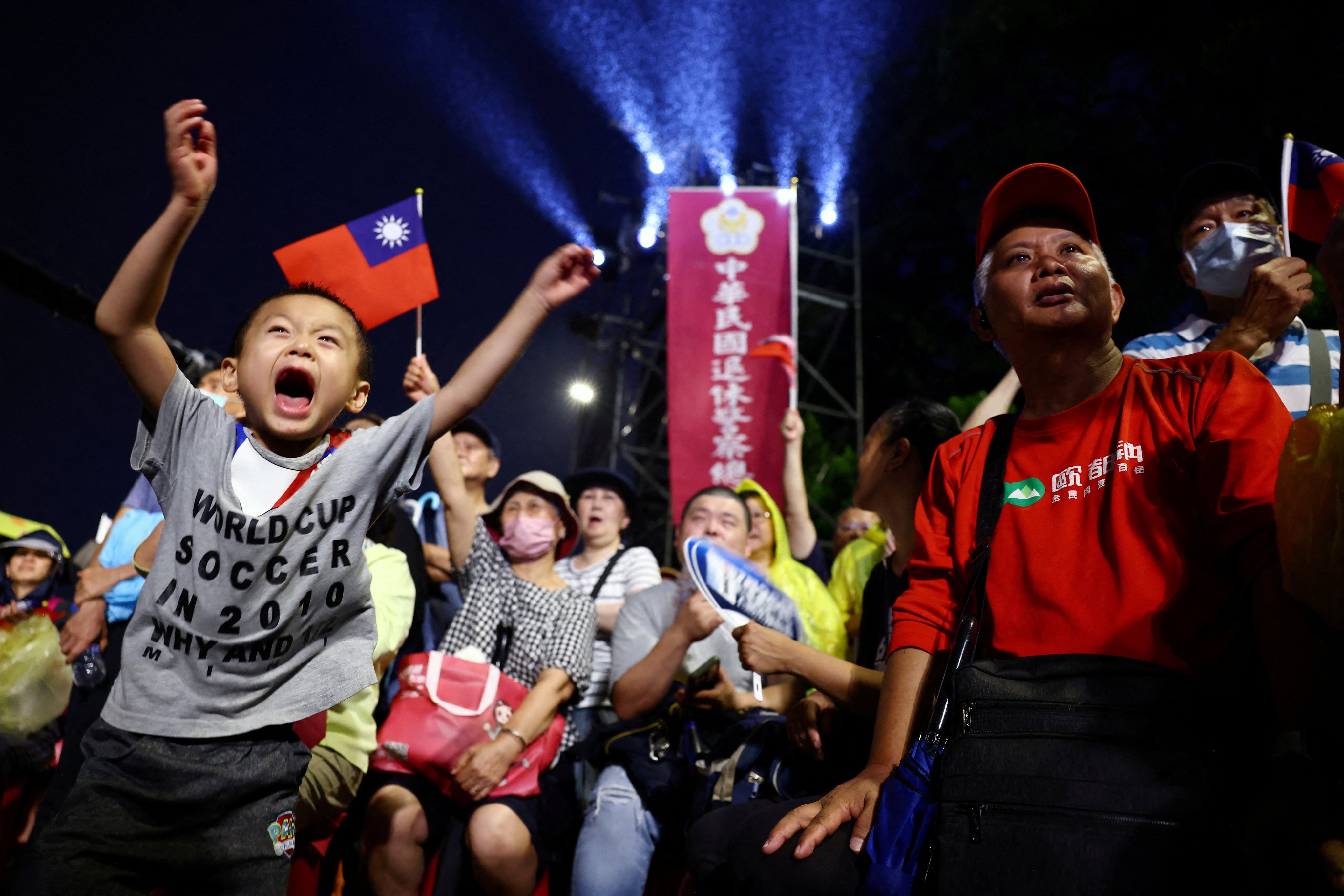 A child reacts as Kuomintang  party supporters rally against a recall election in Taipei on July 25. Photo: Reuters