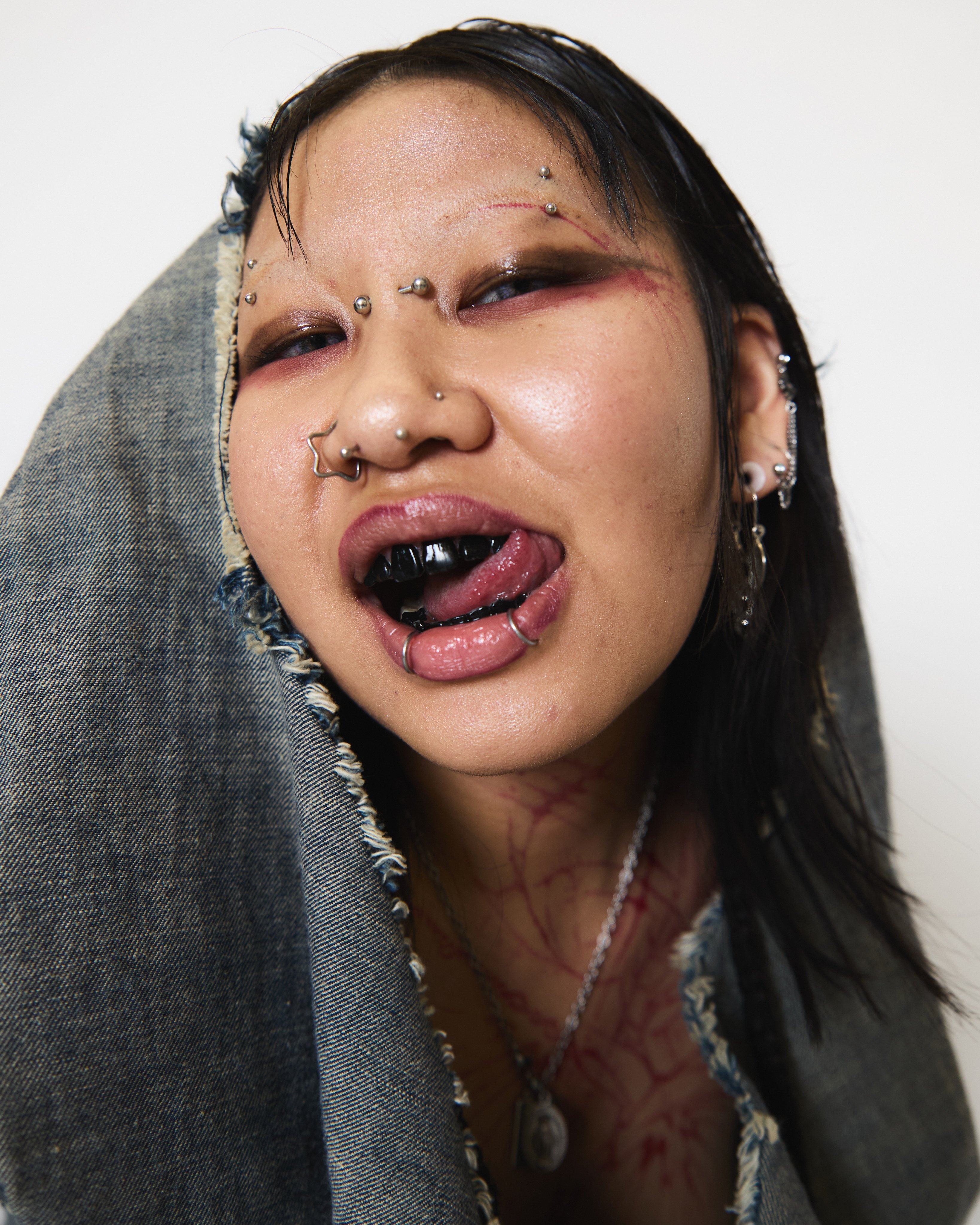 Aspiring fashion designer Mou Isabel Phung, who goes by Mou, at Camille Renée’s senior show at the Columbus College of Art and Design. Photo: Gabrielle Shamon
