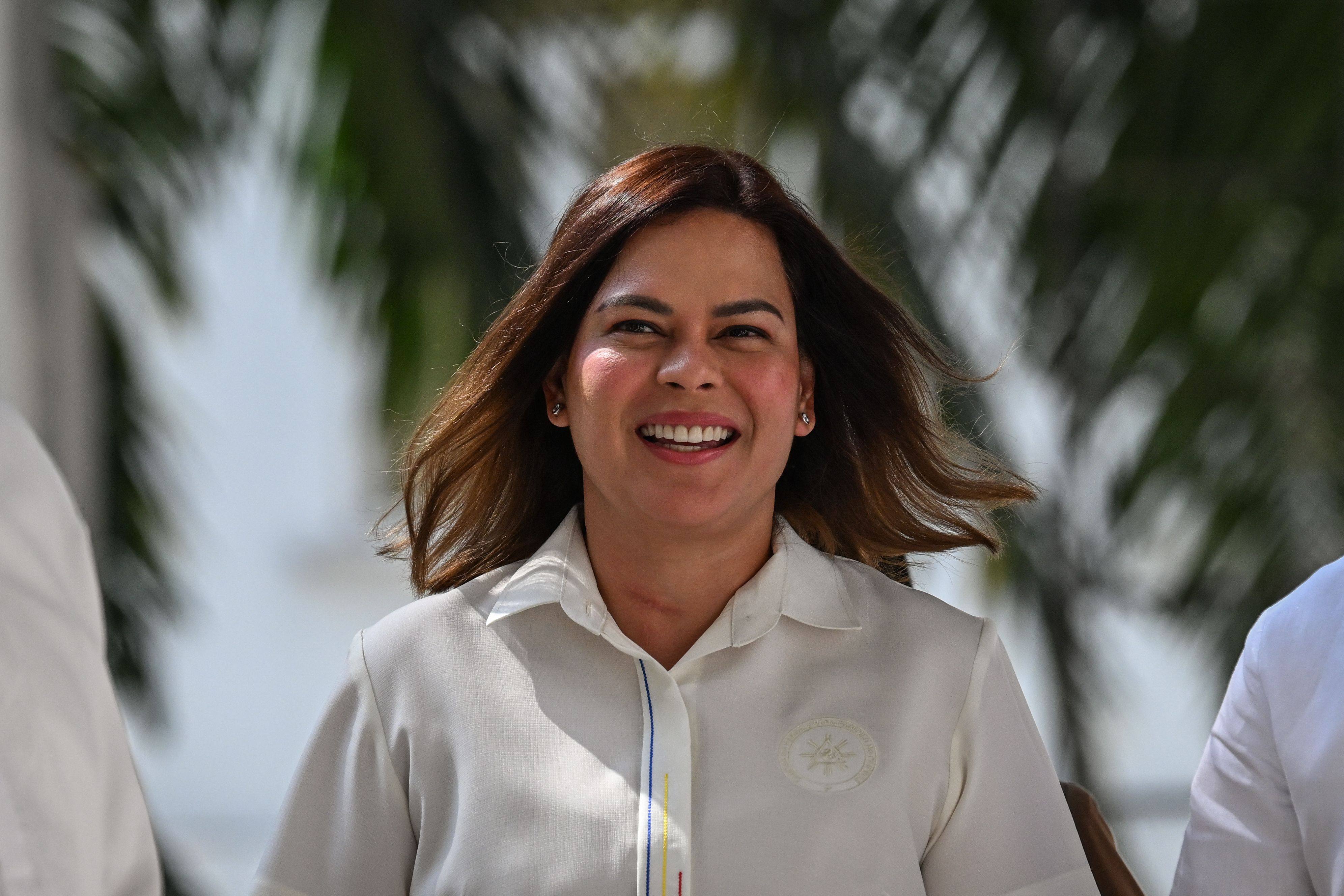 Philippine Vice-President Sara Duterte walks after filing her counter affidavit regarding her alleged threat to President Ferdinand Marcos Jnr at the Department of Justice in Manila on May 9. Photo: AFP