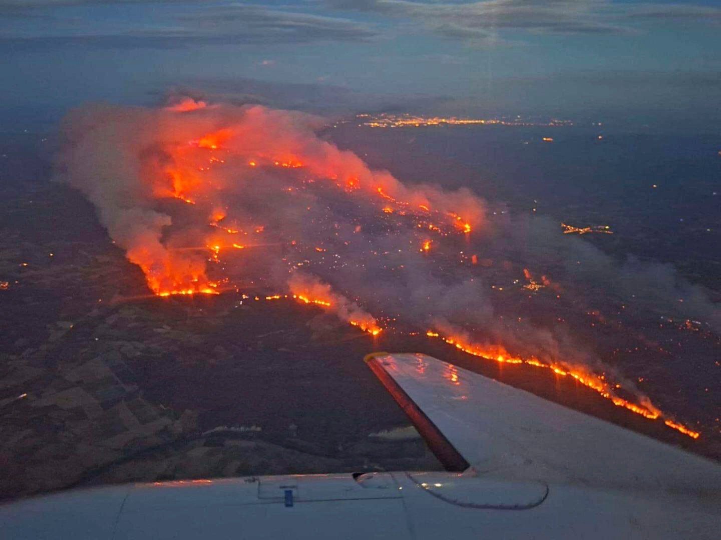 A wildfire in a Mediterranean region near the Spanish border, southern France, is seen from the air on Tuesday. Photo: Securite Civile via AP