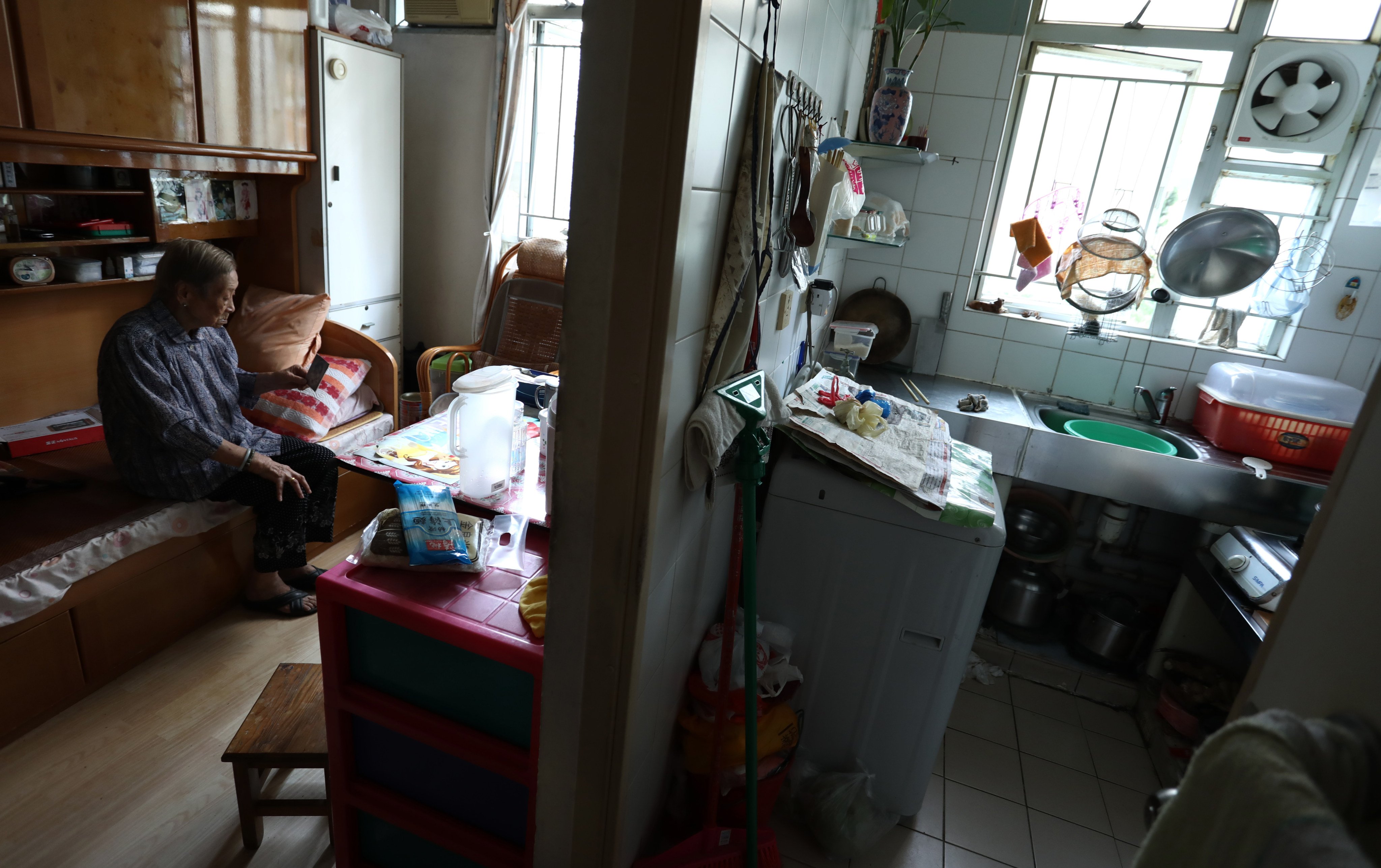 Lam Hau-chai, 94, at her home in Shek Hei House, Shek Lei (II) Estate, Kwai Chung. Photo: Jonathan Wong