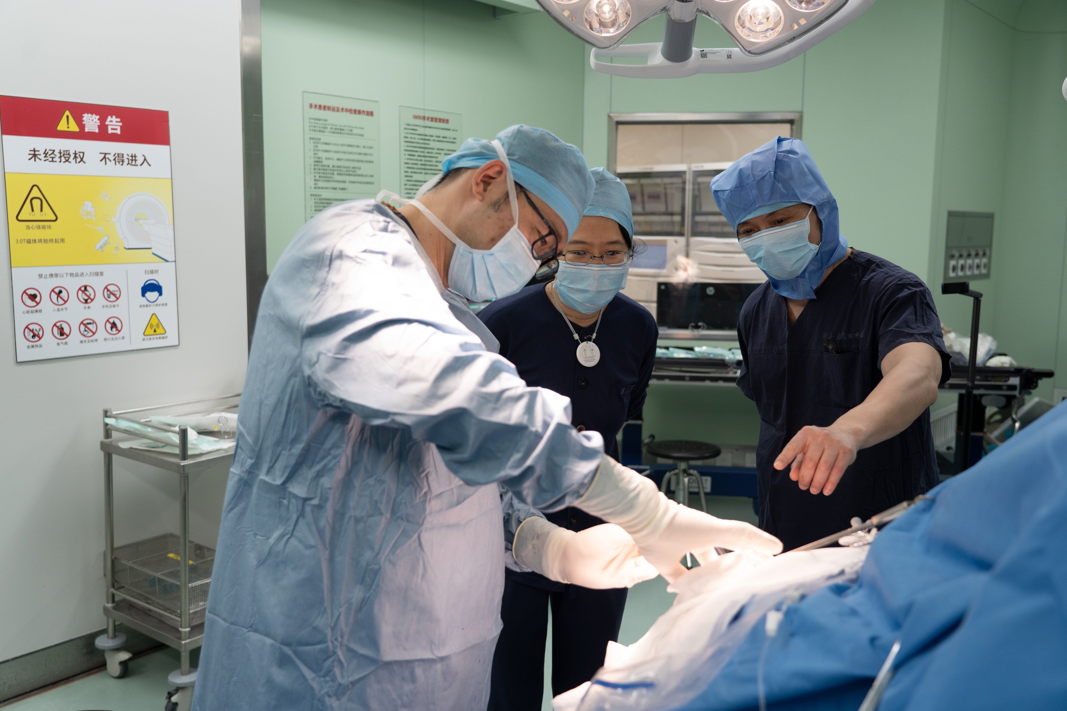 Doctors inspect a brain-computer interface in Shanghai in March. Neuroscience will be a key player in the US-China tech rivalry. Photo: Xinhua