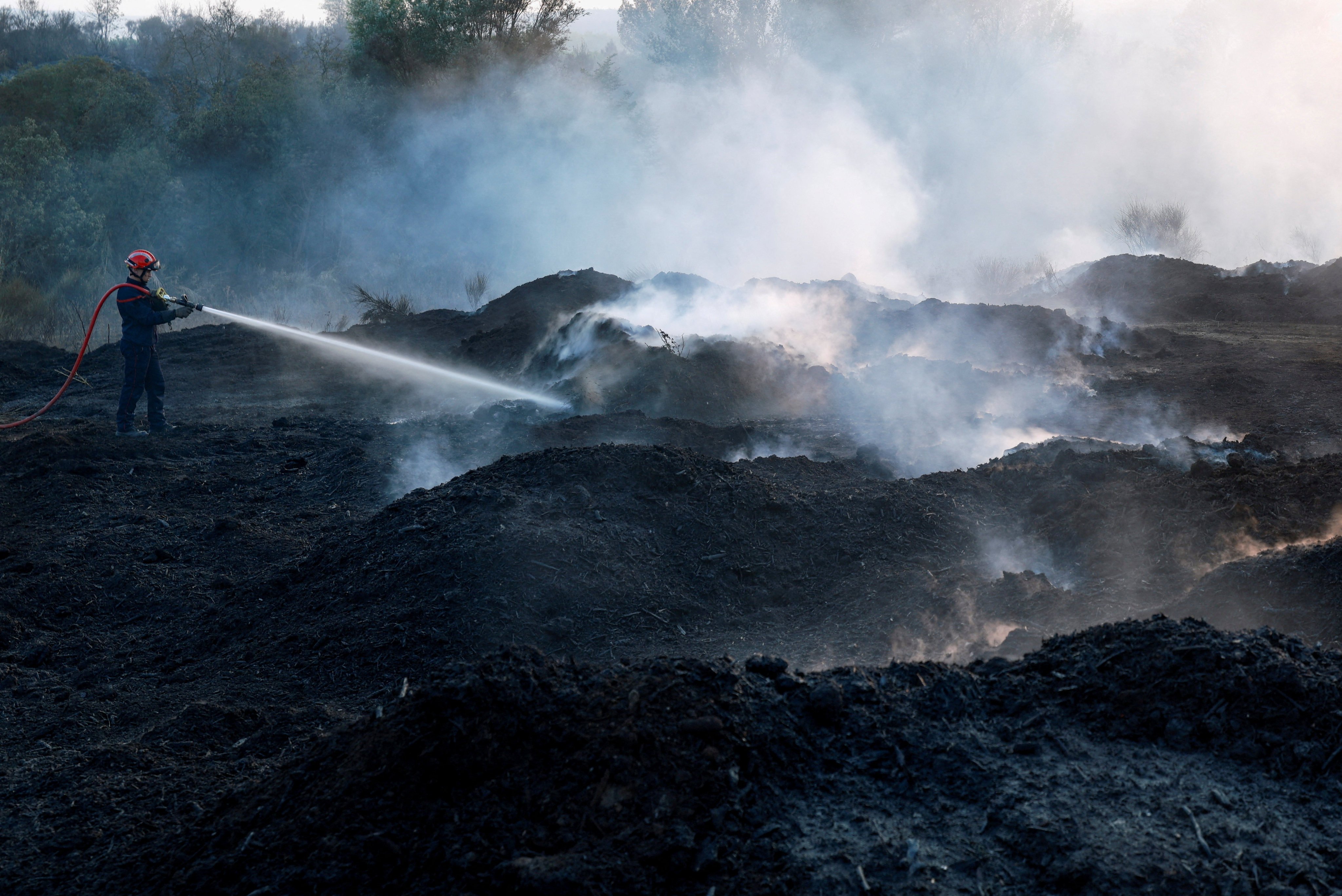 Land scorched by a wildfire near Saint-Laurent-de-la-Cabrerisse, southern France. Photo: Reuters