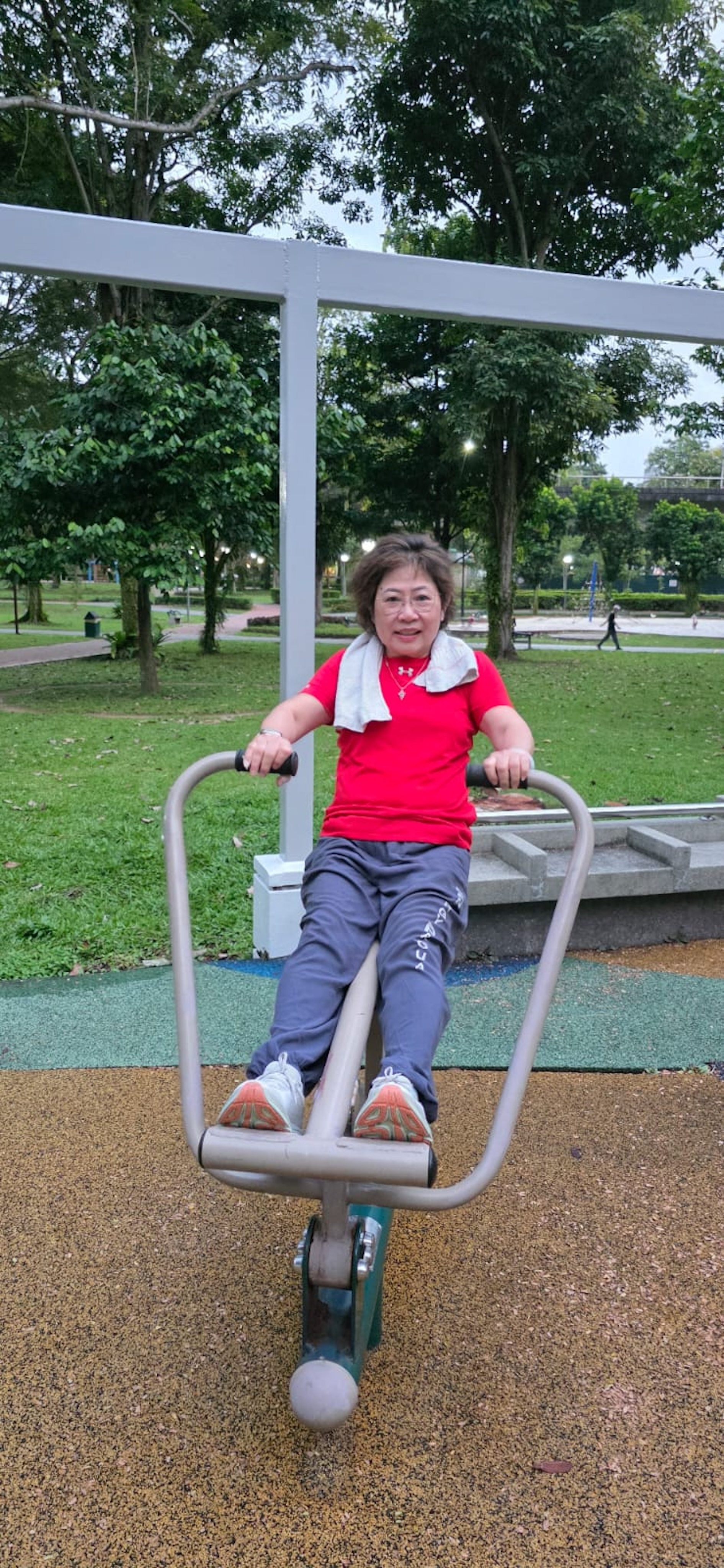 Financial services director Lesley Quak exercises at a local park in Singapore. She was determined to lose weight and get healthier after a less-than-satisfactory medical diagnosis 10 years ago, which saw her join AIA Singapore’s AIA Vitality programme. Photo: Lesley Quak