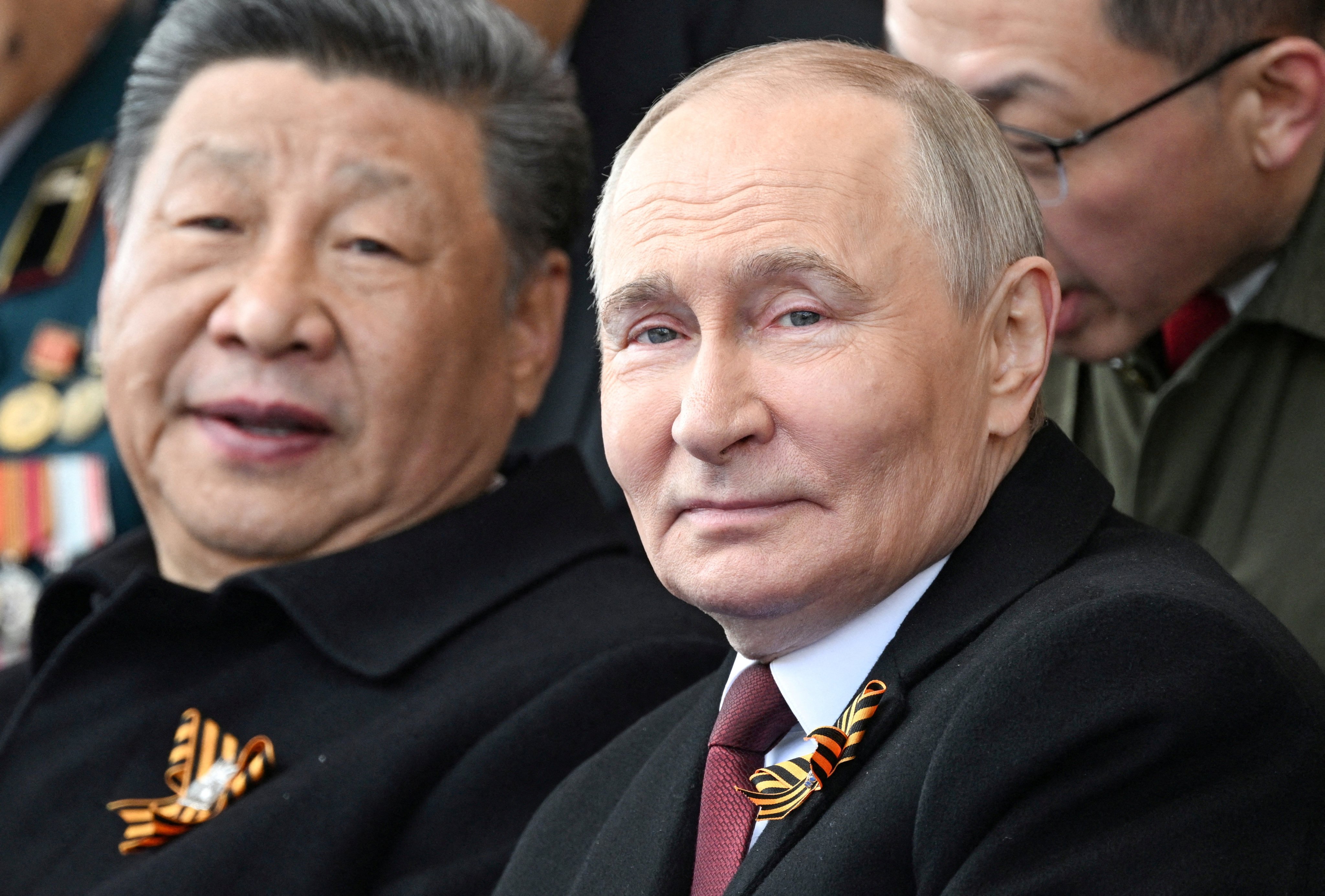 The call between Russian President Vladimir Putin (right) and his Chinese counterpart Xi Jinping on Friday underscored a high level of coordination between Beijing and Moscow in their approach to Washington. Photo: RIA Novosti via Reuters