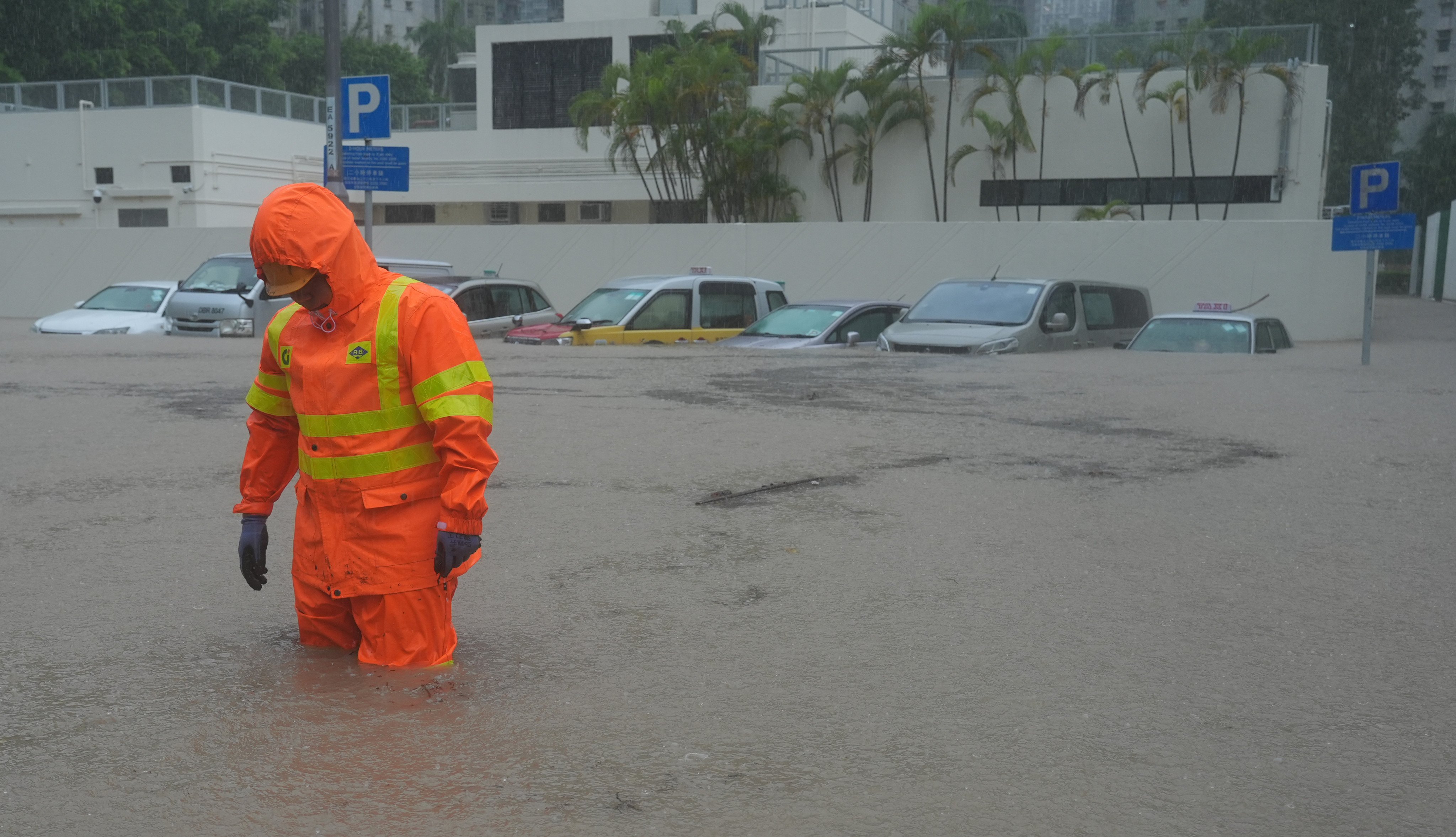 An outdoor car park on King Yin Lane in Tseung Kwan O was inundated om Tuesday, when a black rainstorm warning was in force. Photo: May Tse