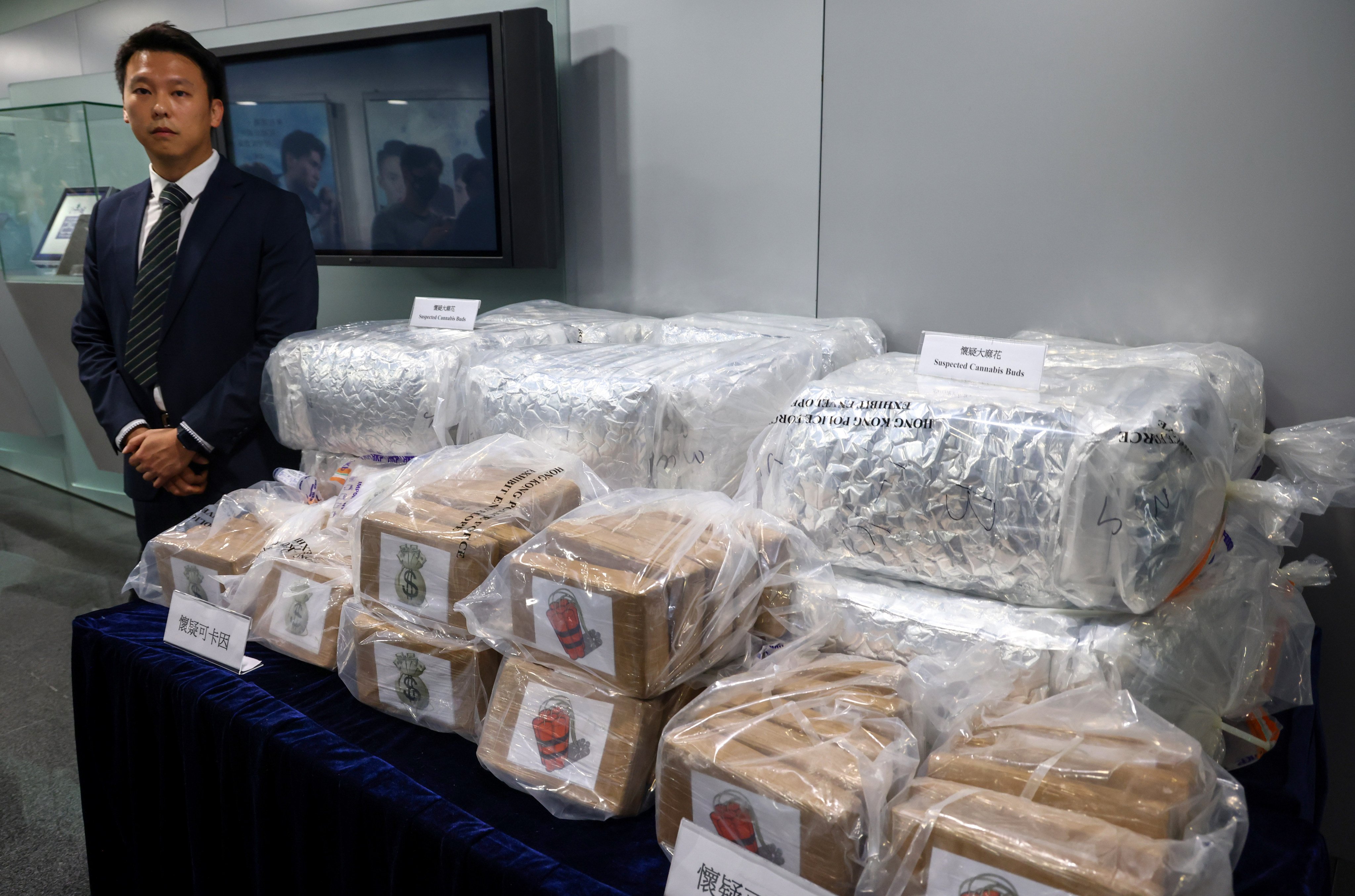 105kg of suspected cocaine and cannabis buds, worth an estimated HK$45 million, was confiscated in two separate busts in Yuen Long and Tsing Yi. Photo: Dickson Lee
