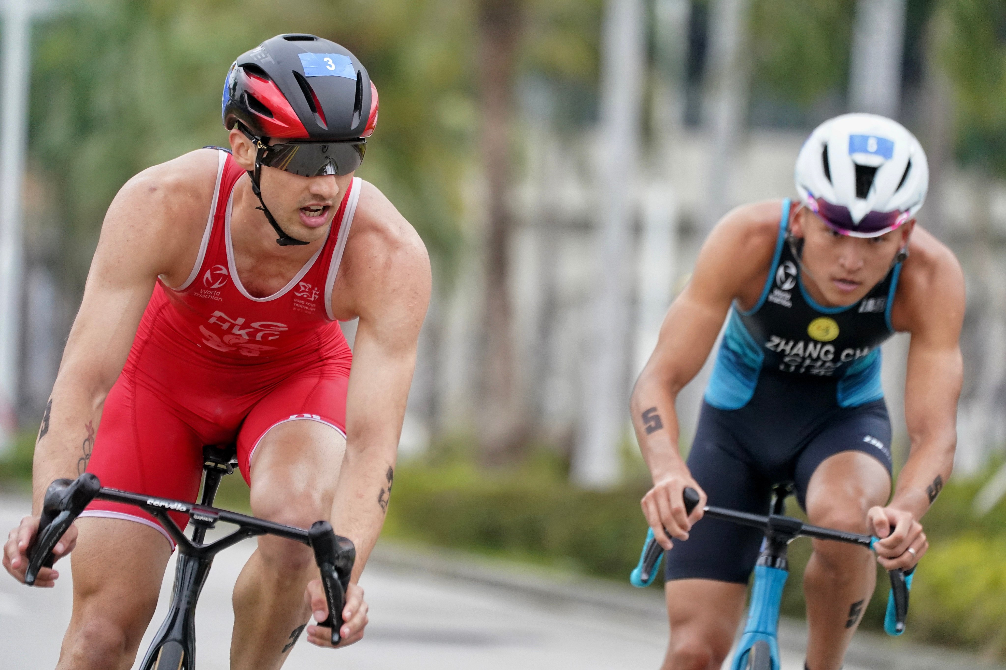 Jason Ng (left), in action during the National Games test event, is among the triathletes who will benefit from a new training base in Yunnan. Photo: Elson Li