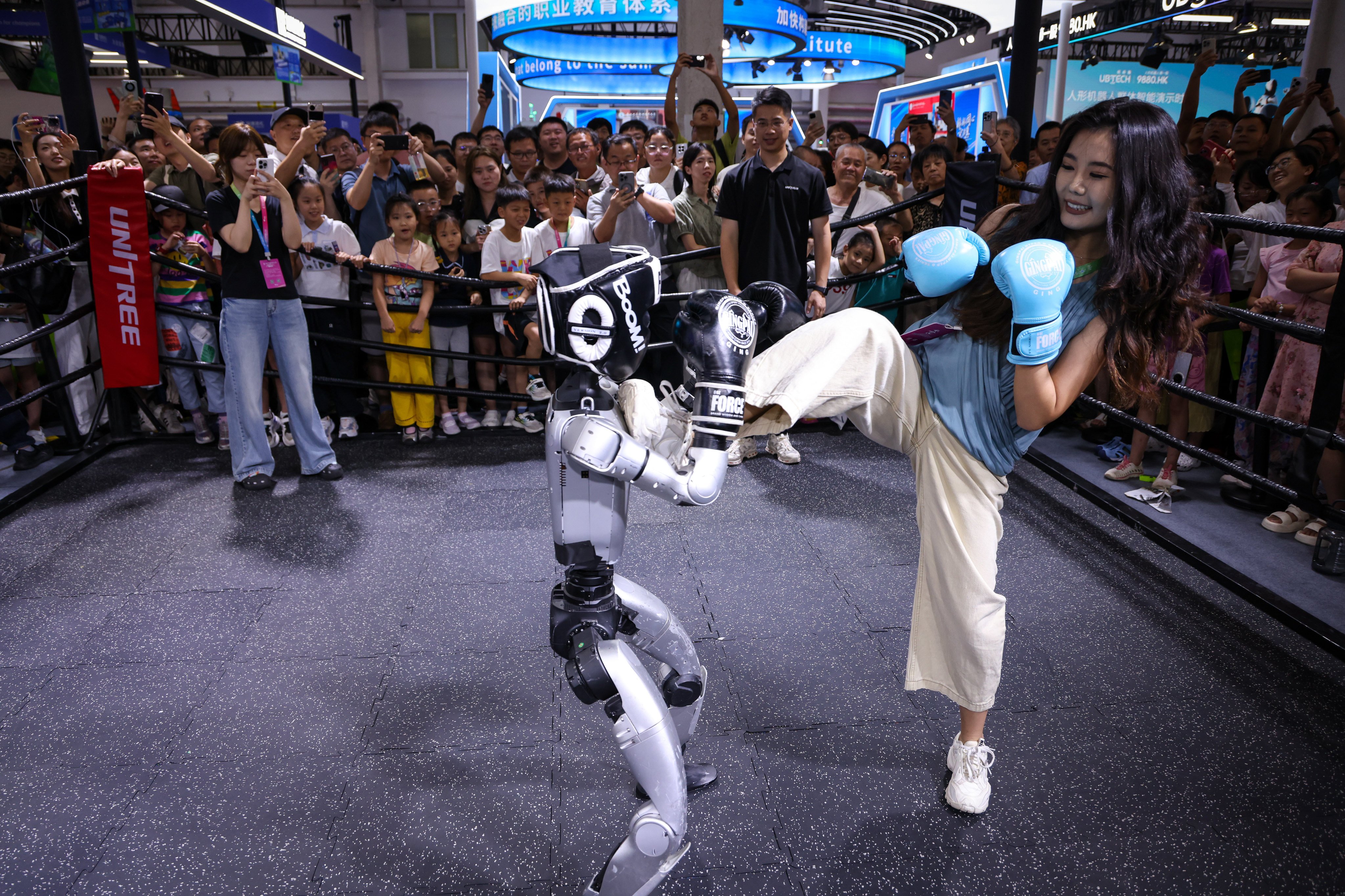 A Unitree Robotics robot gives a combat performance at the 2025 World Robot Conference in Beijing on August 8, 2025. Photo: Xinhua