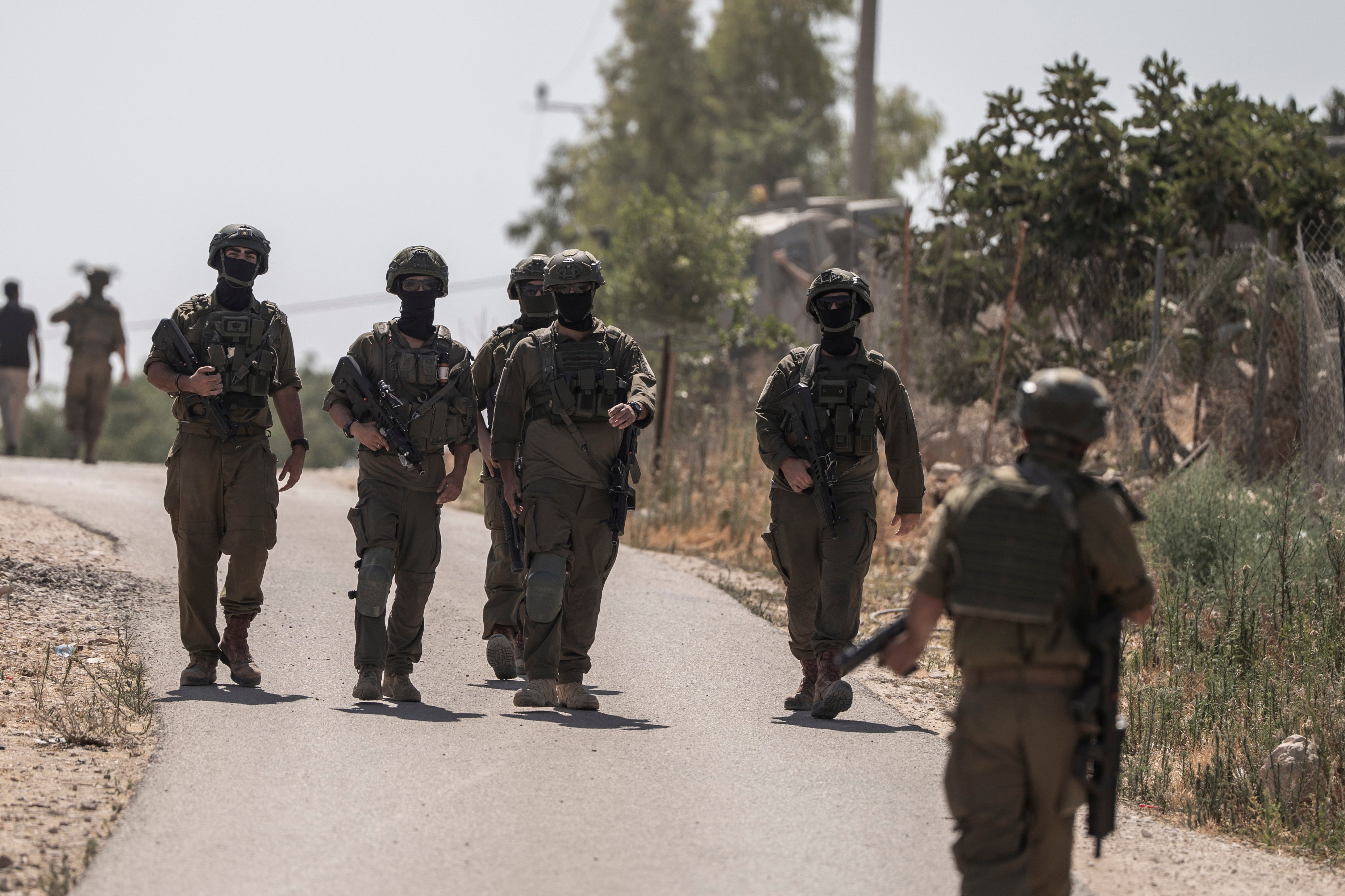 Israeli Defence Forces raid the tent where Palestinians gathered to mourn Awdah Al-Hathaleen, who was shot by an Israeli right-wing settler on July 28. Photo:/dpa