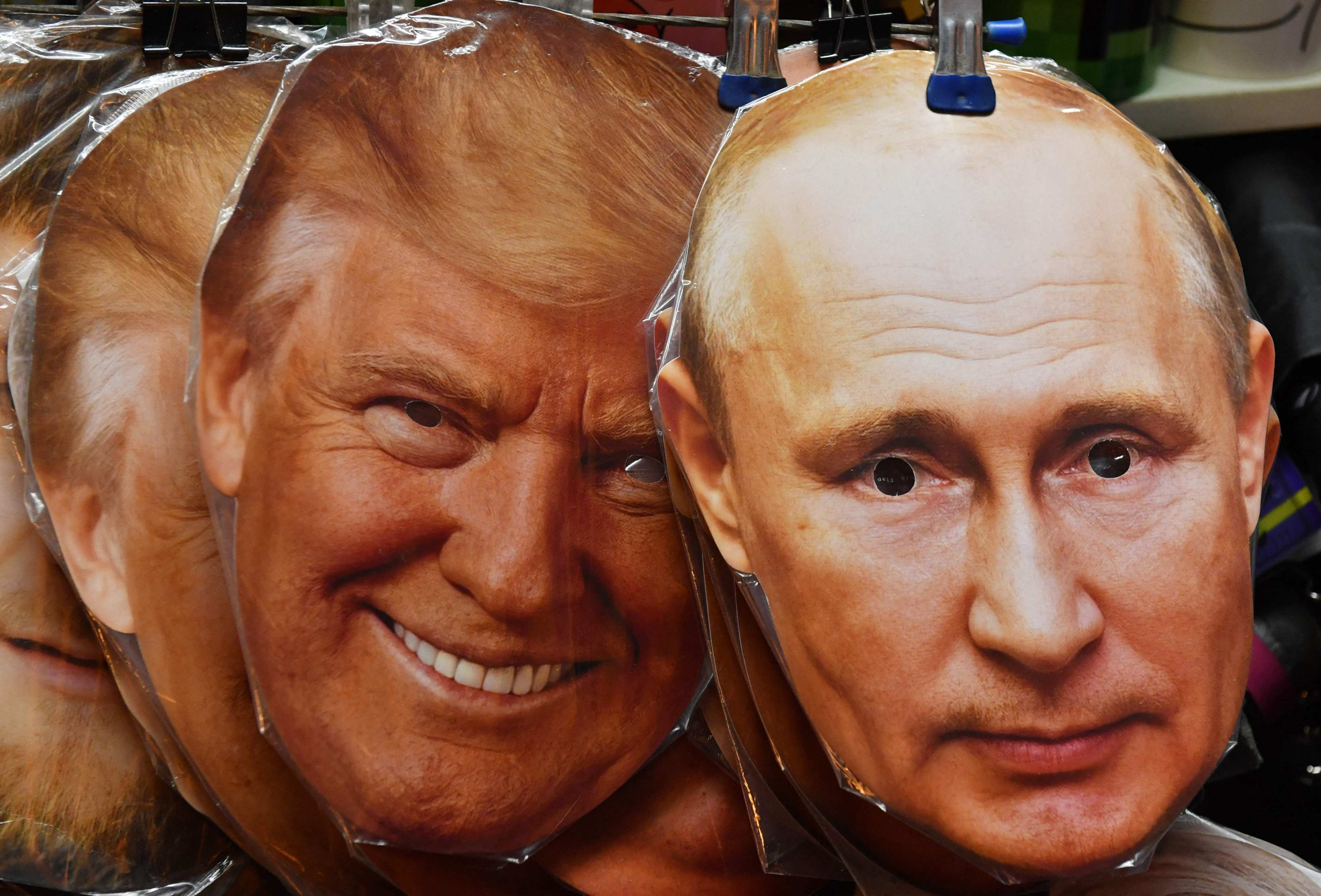Masks of Russia’s President Vladimir Putin and US President Donald Trump for sale in St Petersburg, Russia. Photo: AFP